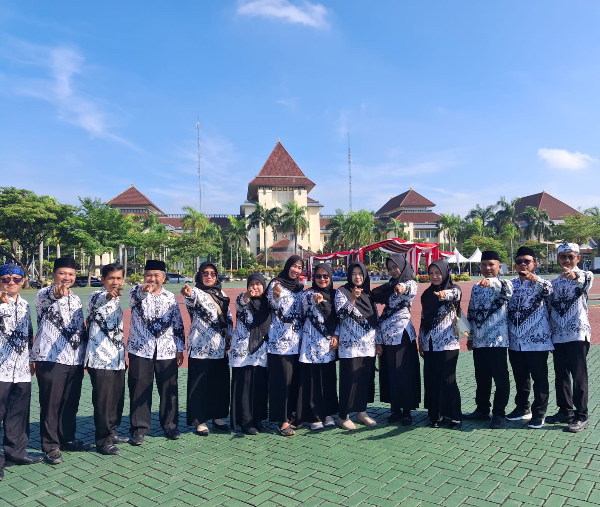 woman wearing yellow long-sleeved dress under white clouds and blue sky during daytime