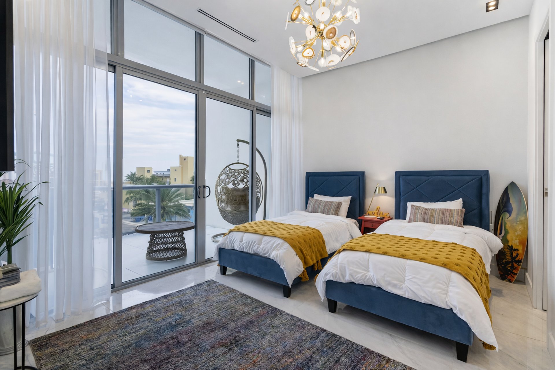 silhouette of palm trees near body of water during sunset