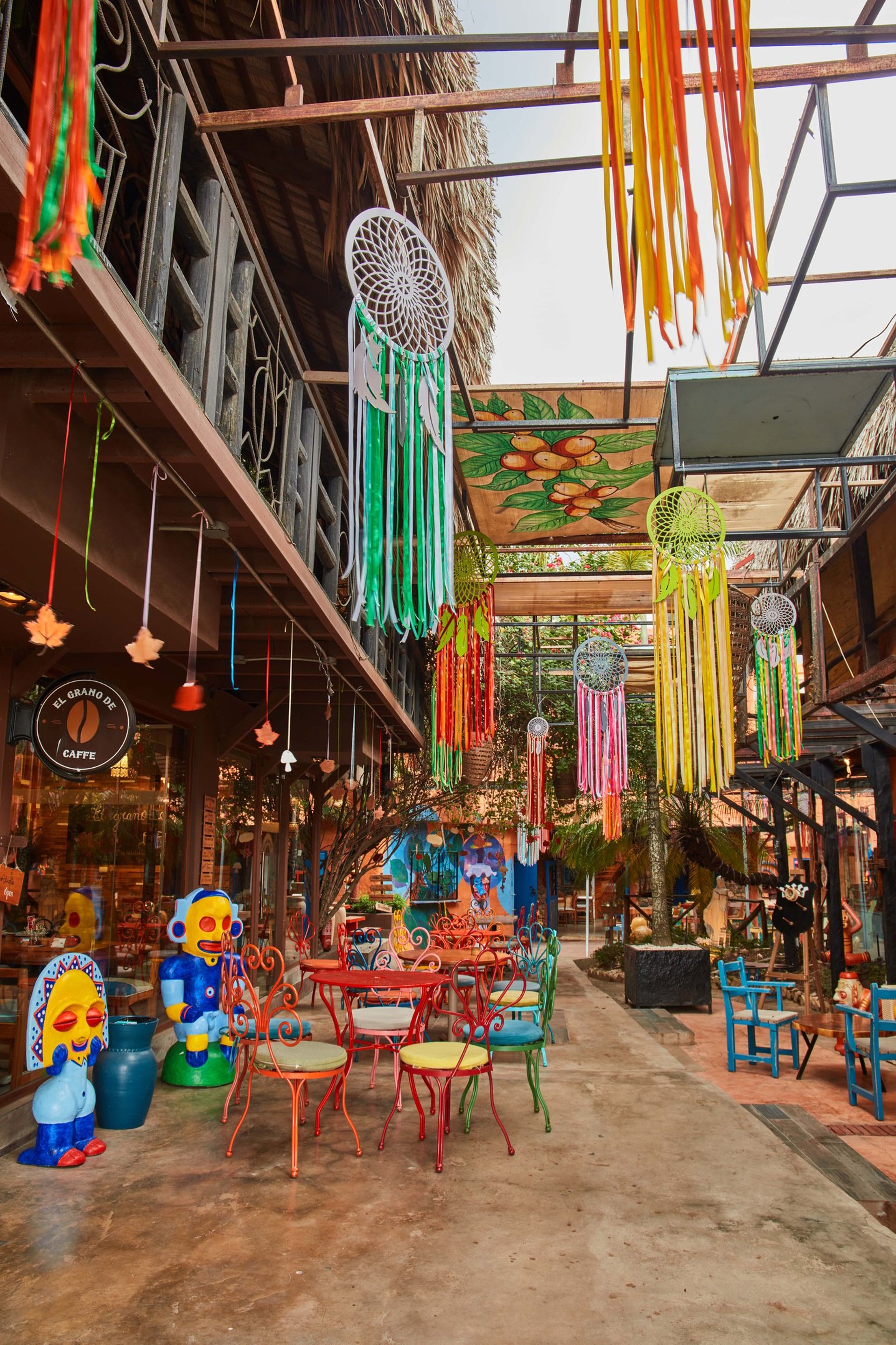 woman wearing yellow long-sleeved dress under white clouds and blue sky during daytime