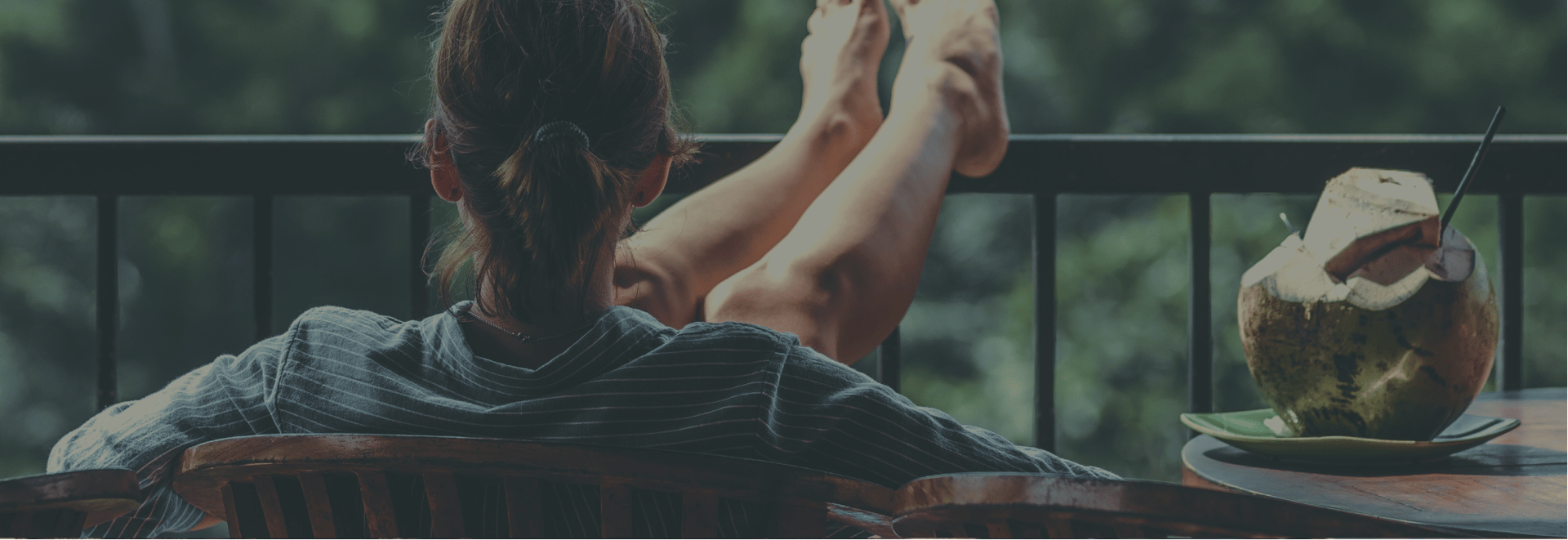 an abstract photo of a curved building with a blue sky in the background