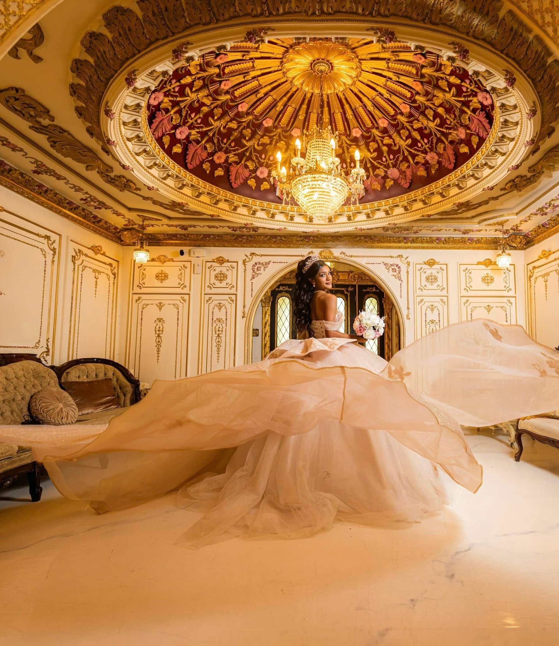 an abstract photo of a curved building with a blue sky in the background