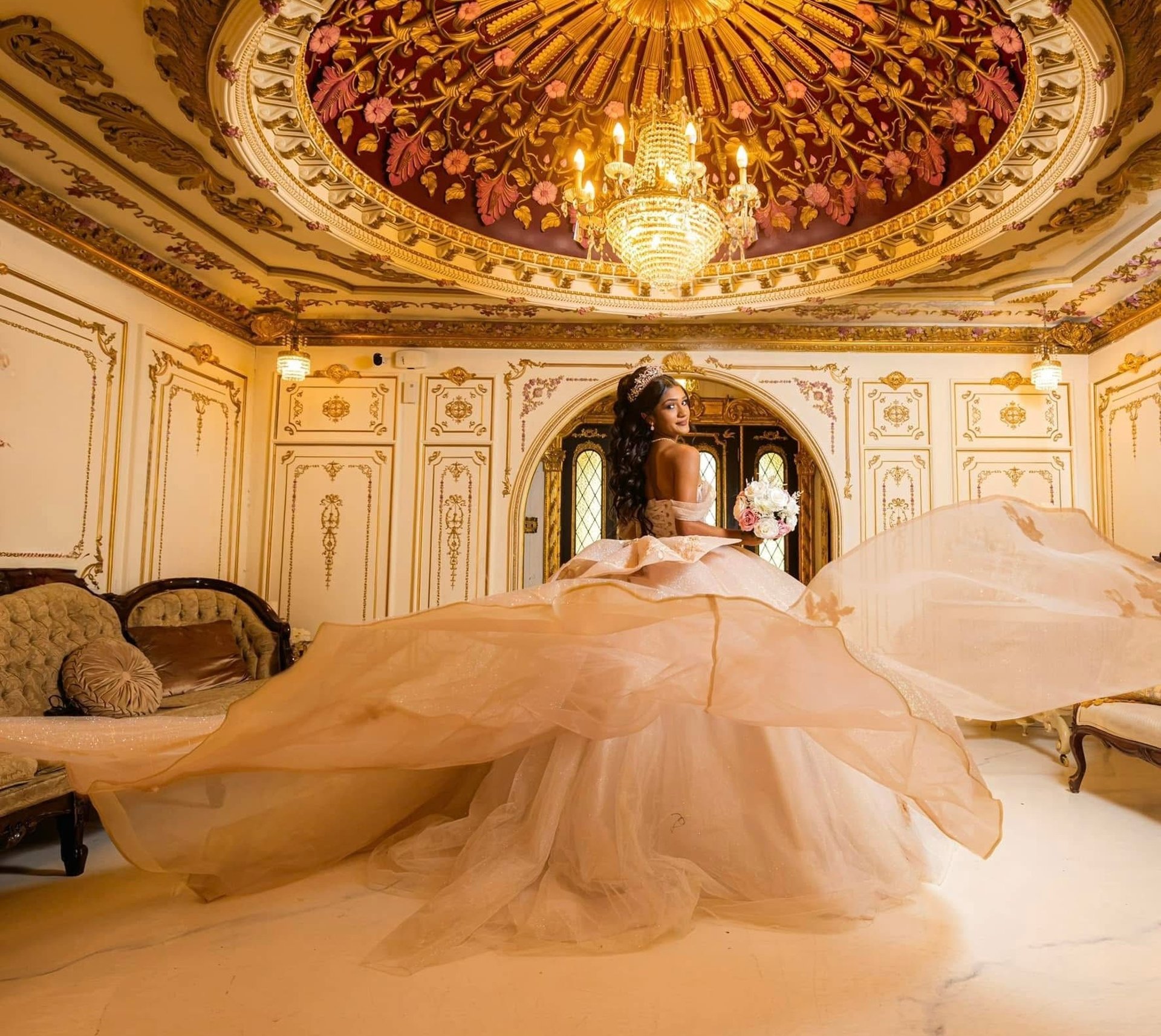 an abstract photo of a curved building with a blue sky in the background