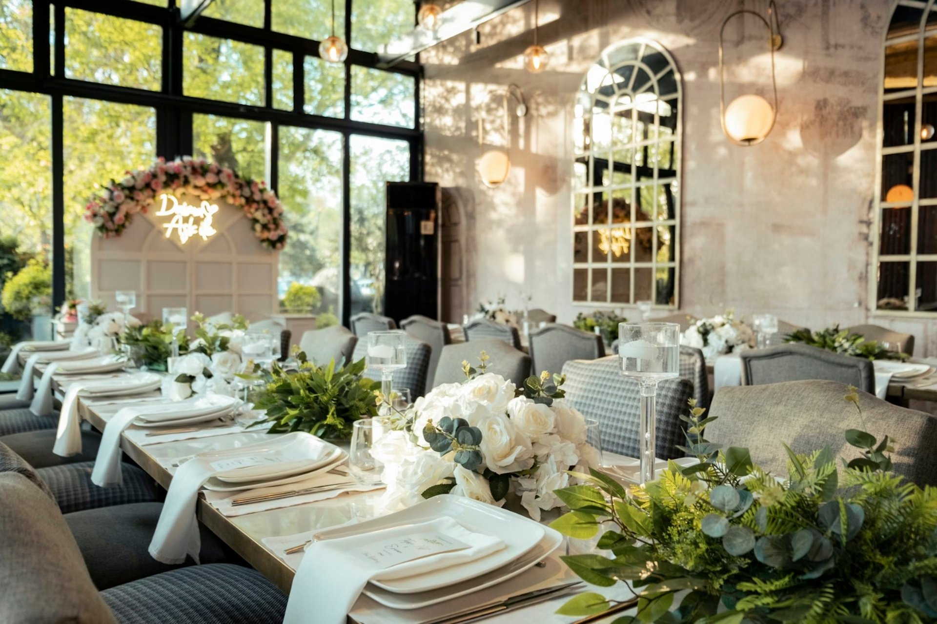 a long table is set with place settings and place settings