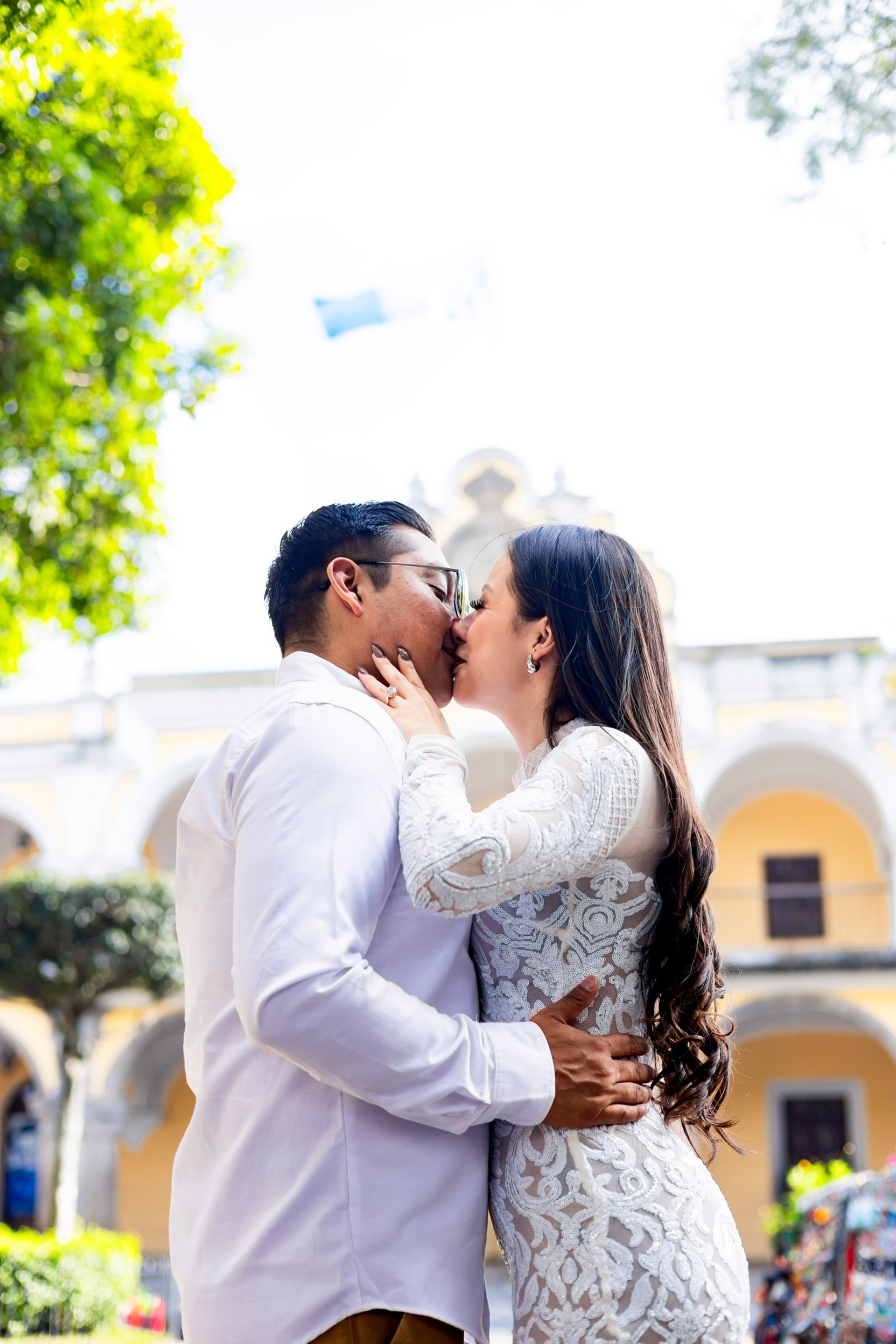 couple wearing silver-colored rings