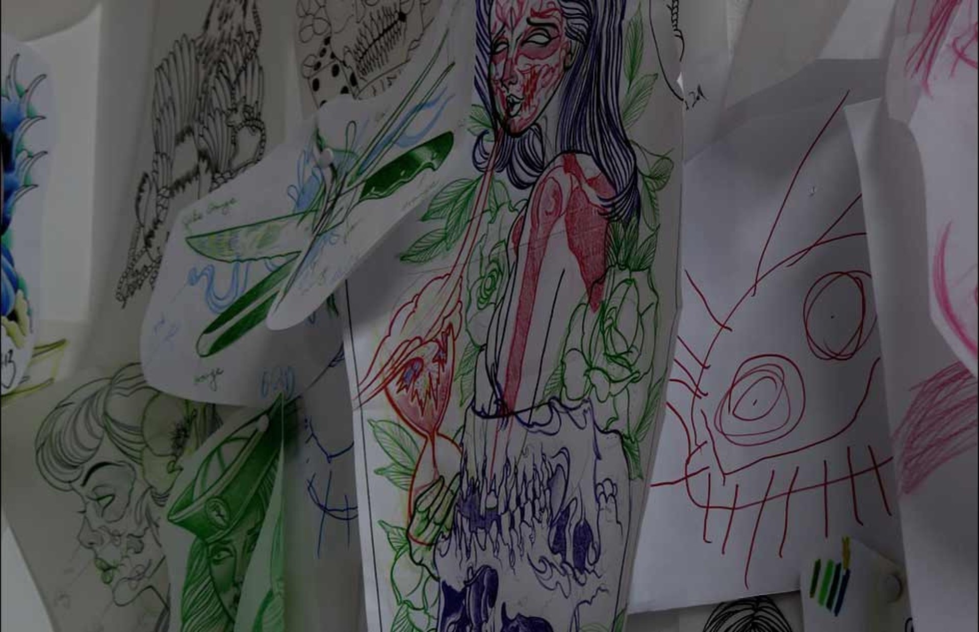 an abstract photo of a curved building with a blue sky in the background