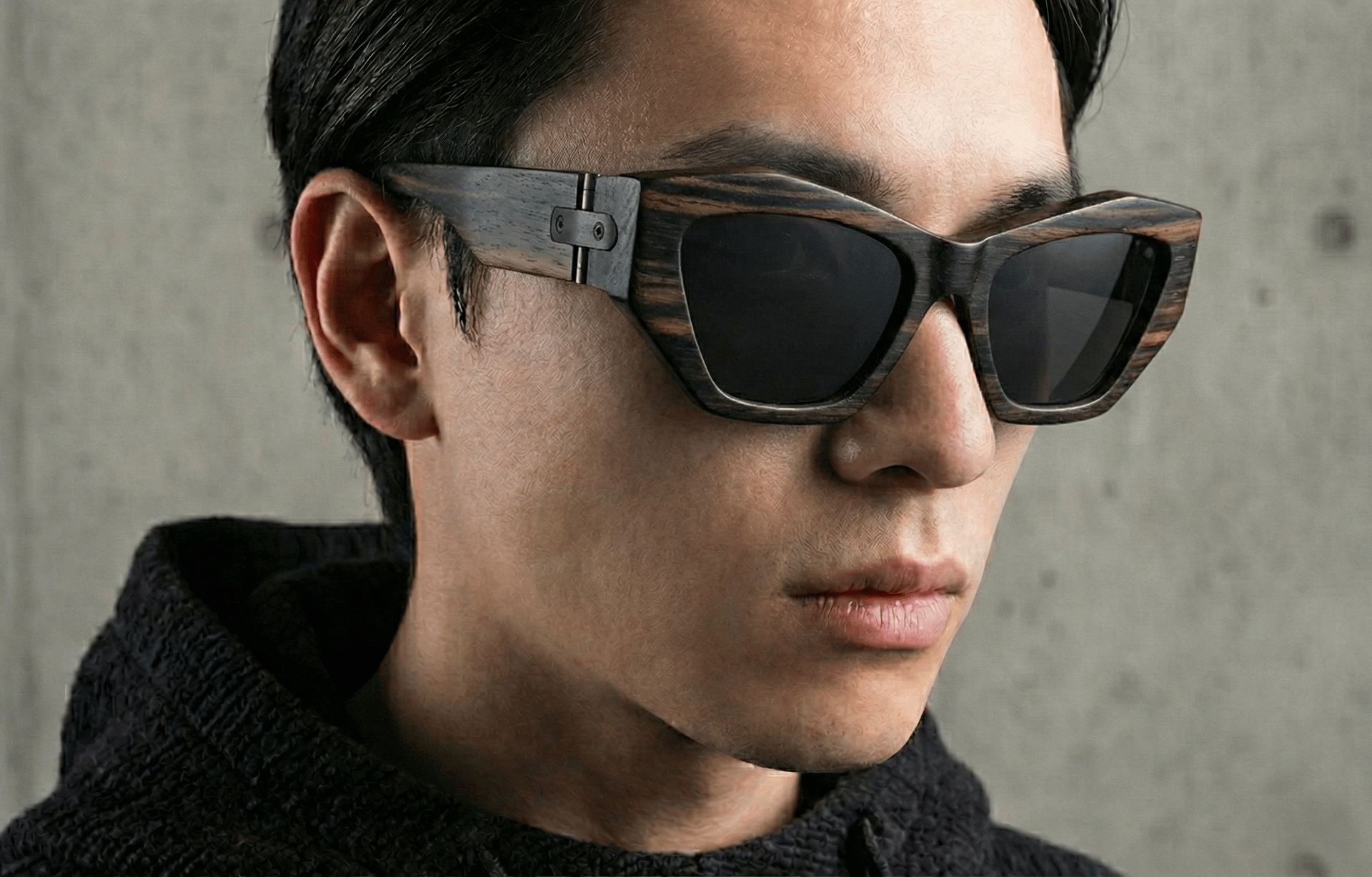 a close up of a black and brown abstract painting