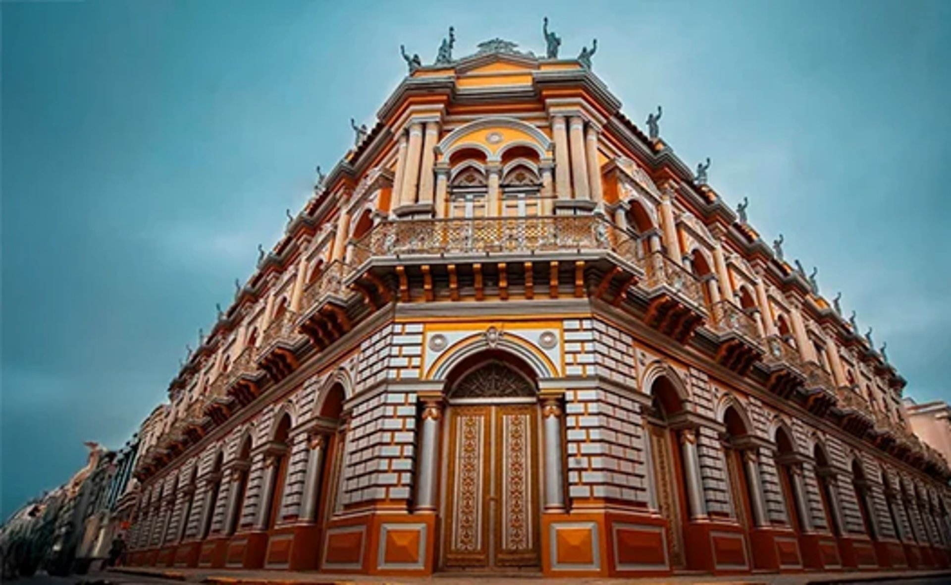 woman wearing yellow long-sleeved dress under white clouds and blue sky during daytime