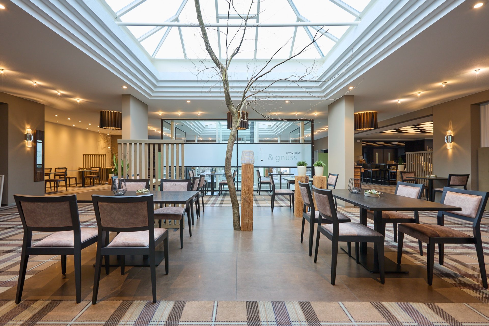 an abstract photo of a curved building with a blue sky in the background
