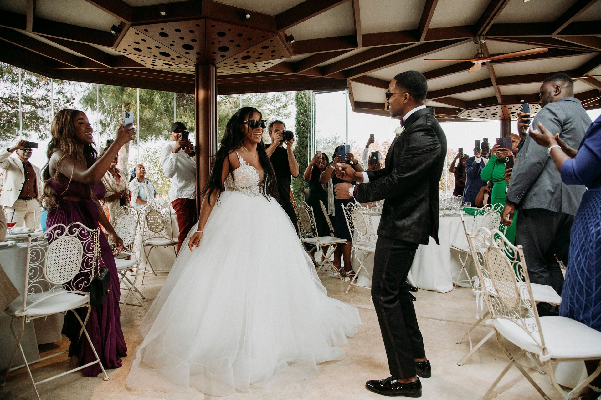 woman wearing yellow long-sleeved dress under white clouds and blue sky during daytime