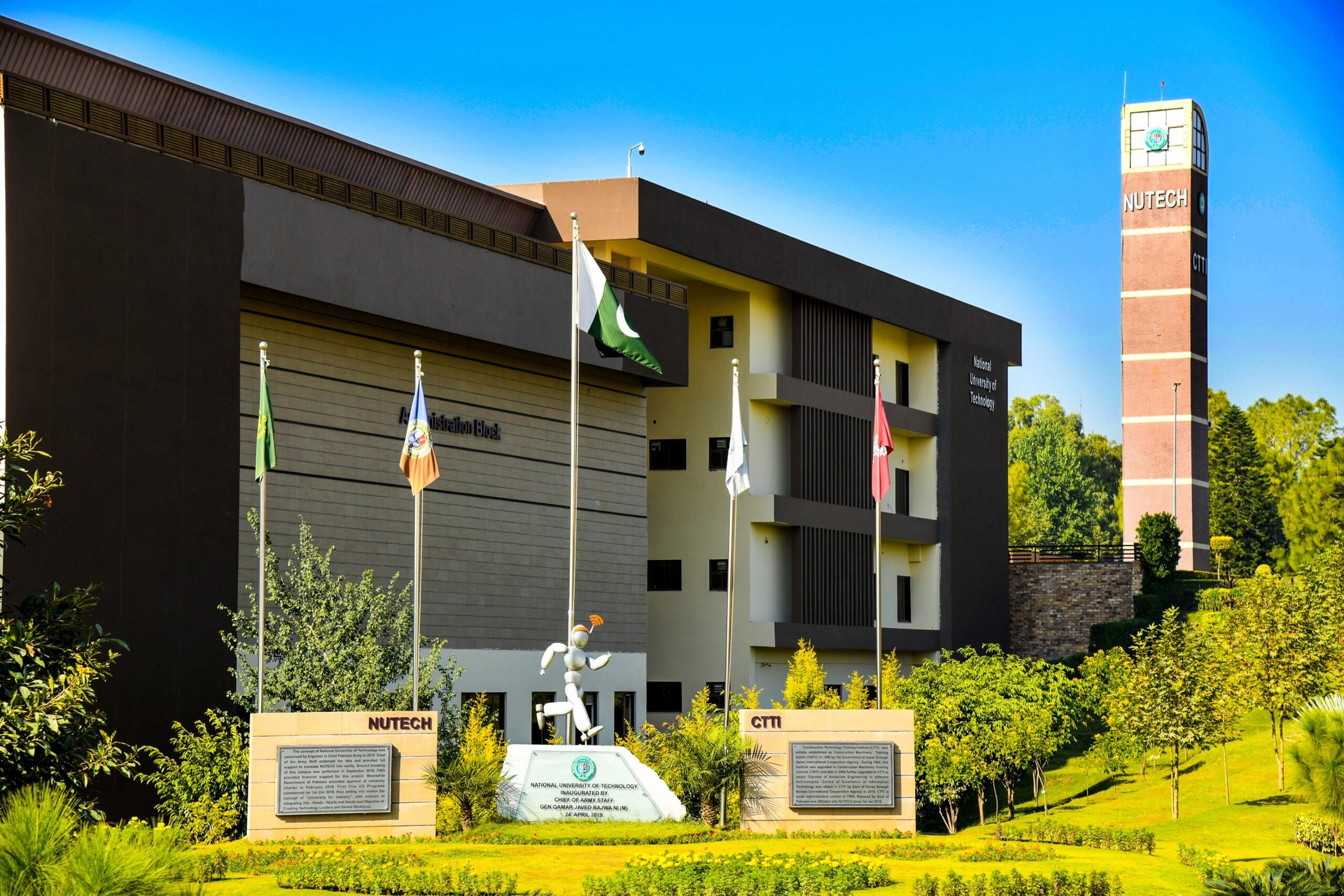 a very tall clock tower towering over a city
