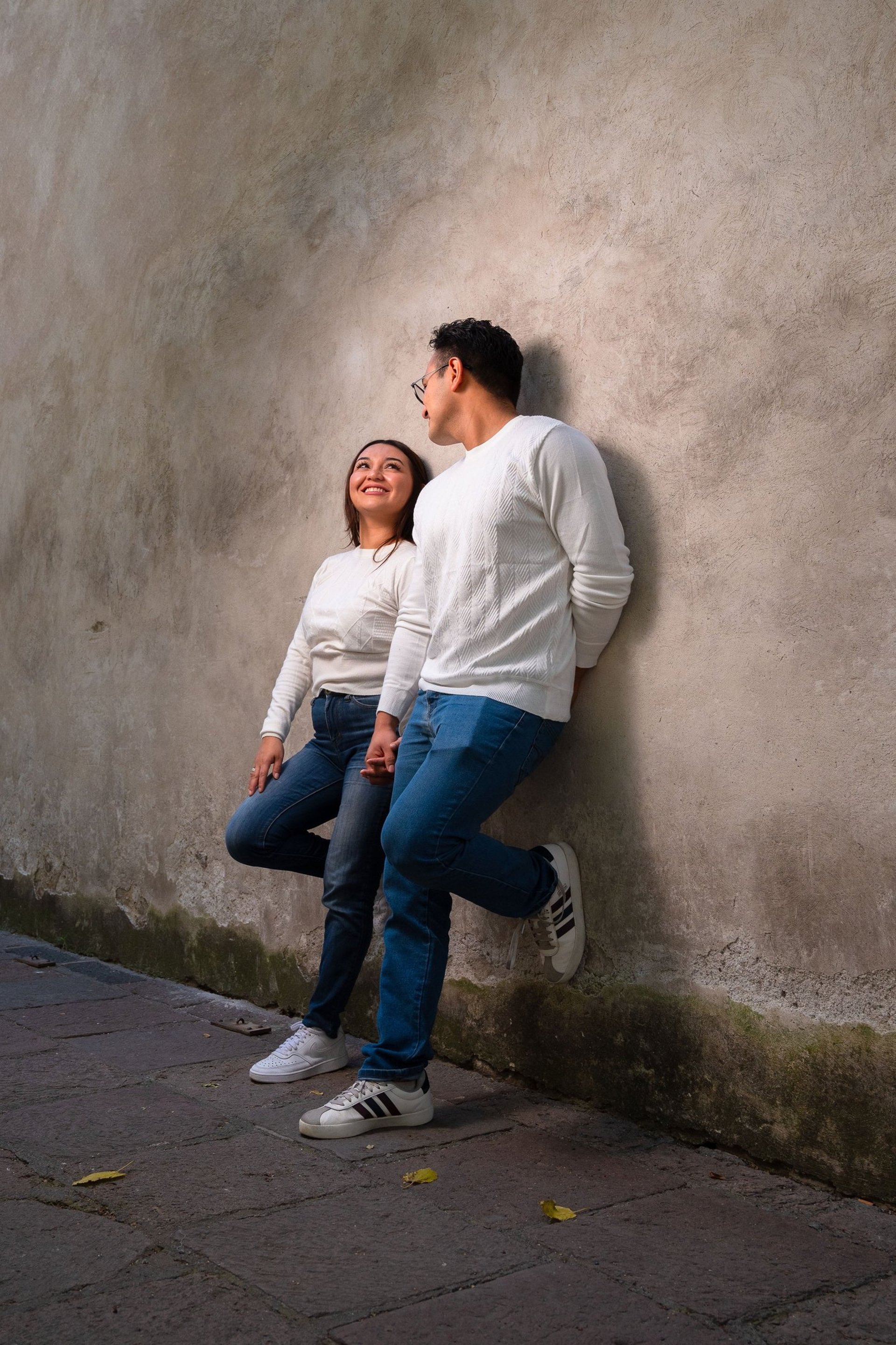 couple wearing silver-colored rings