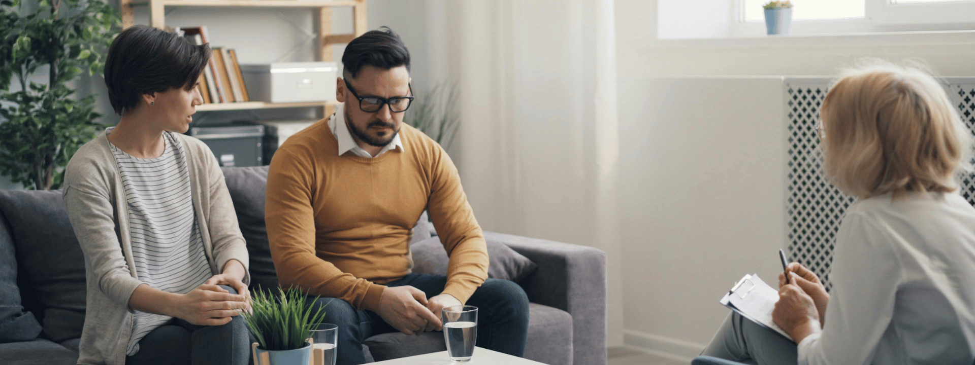 an abstract photo of a curved building with a blue sky in the background