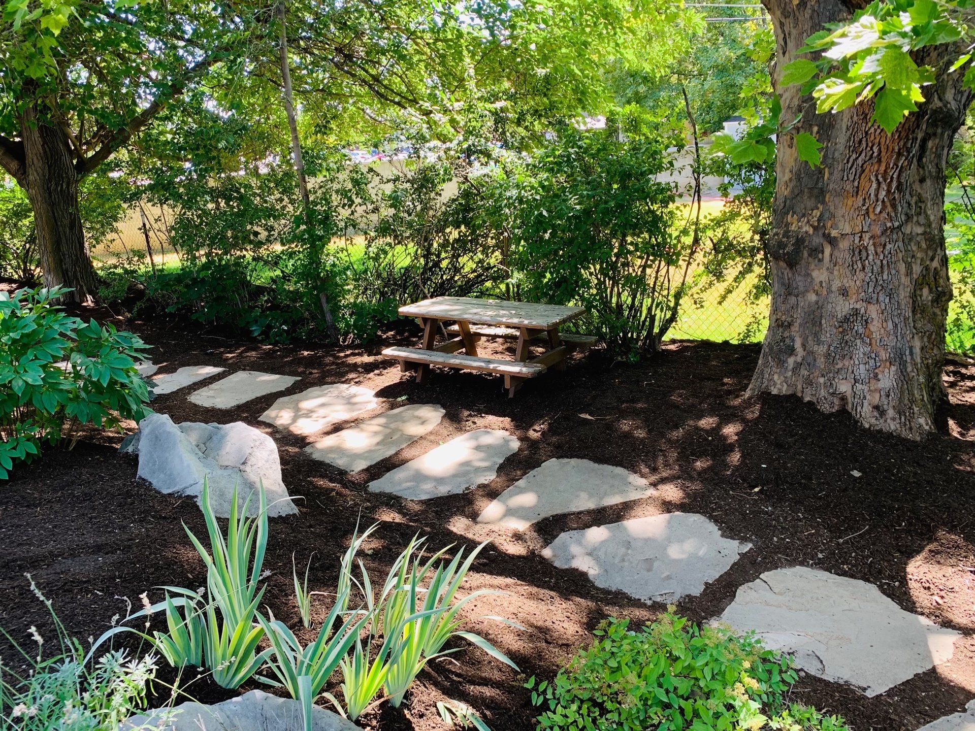 woman wearing yellow long-sleeved dress under white clouds and blue sky during daytime