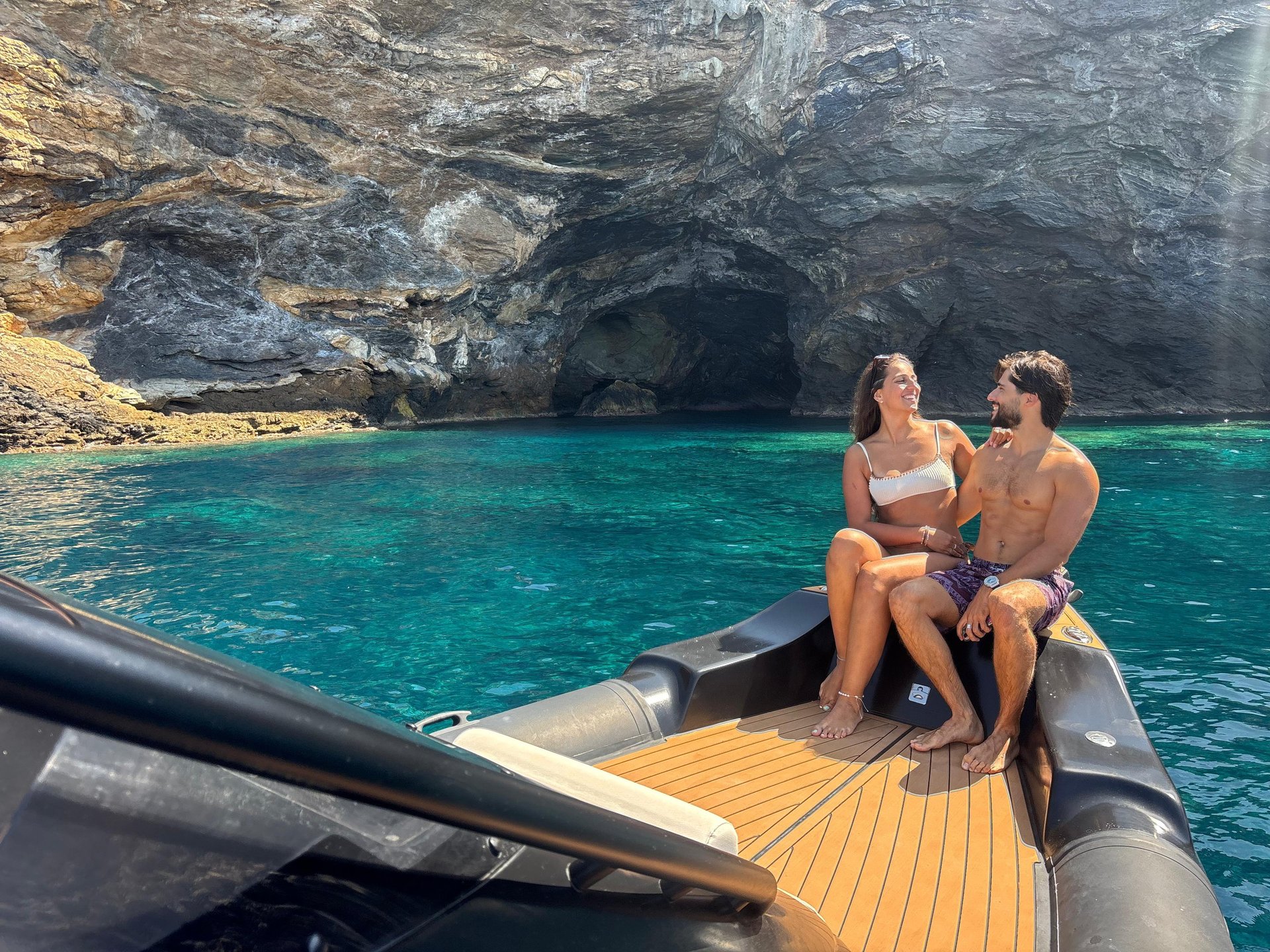 black and brown leather padded tub sofa