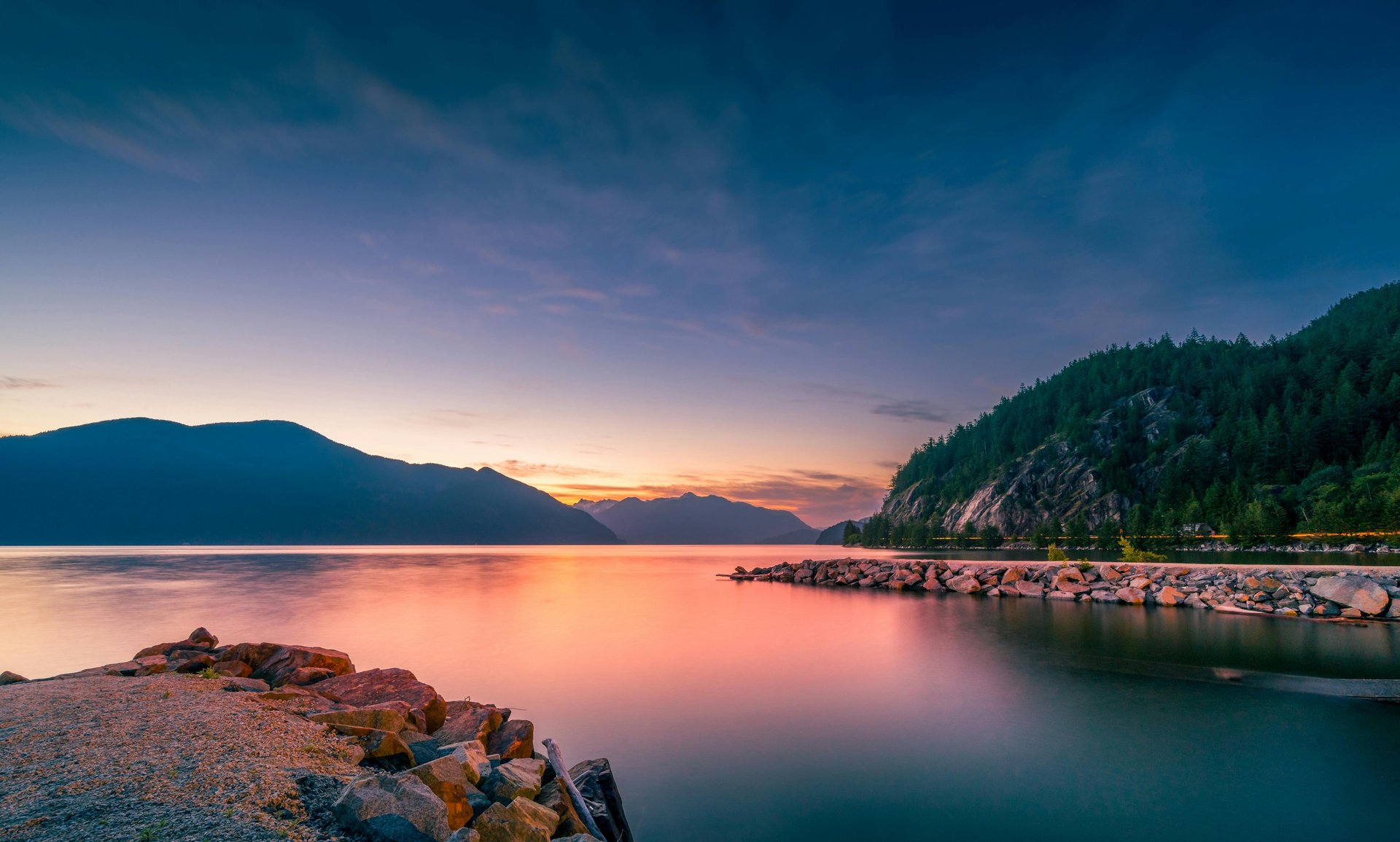 A person doing a handstand on a road