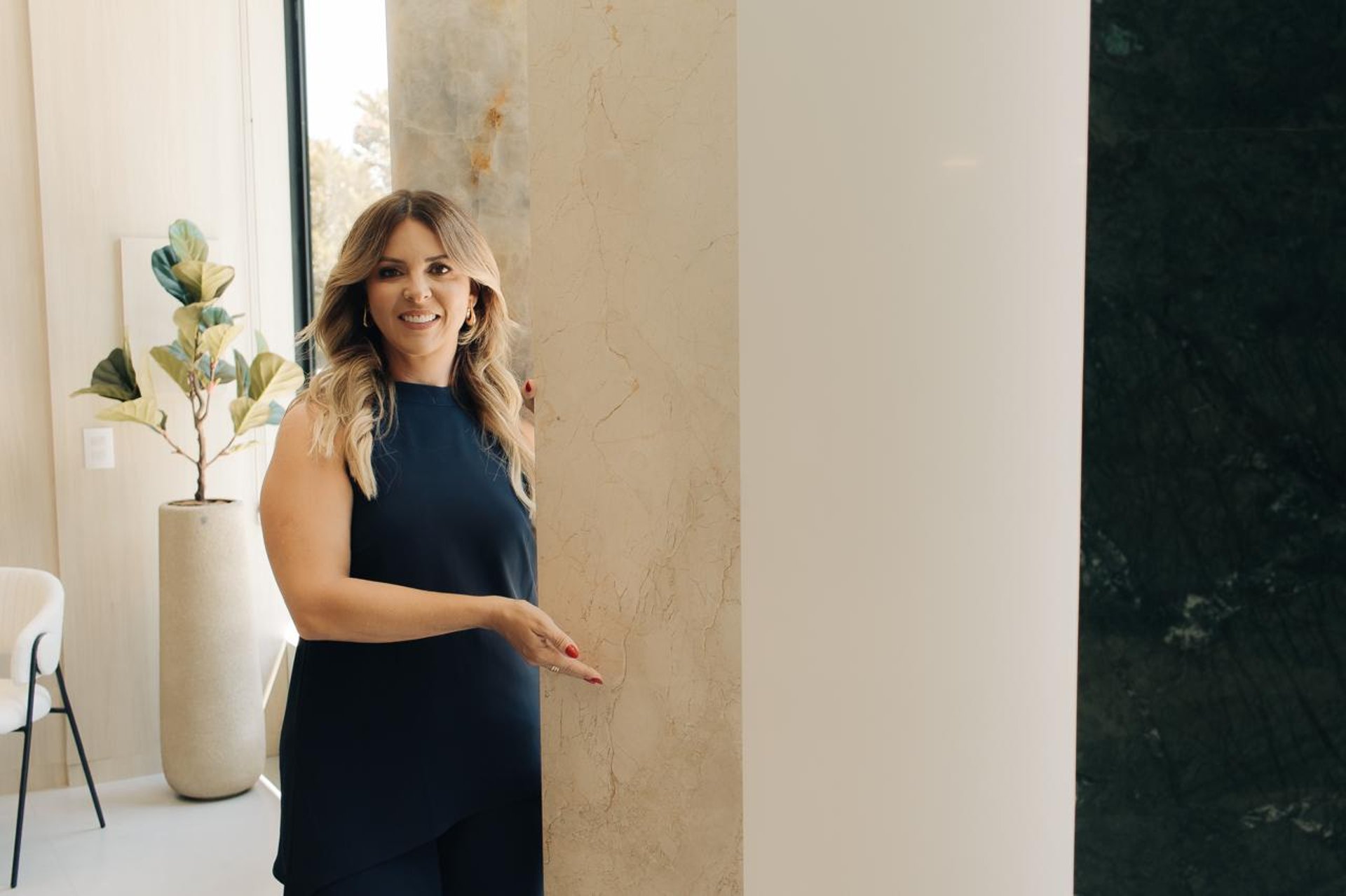 woman wearing yellow long-sleeved dress under white clouds and blue sky during daytime