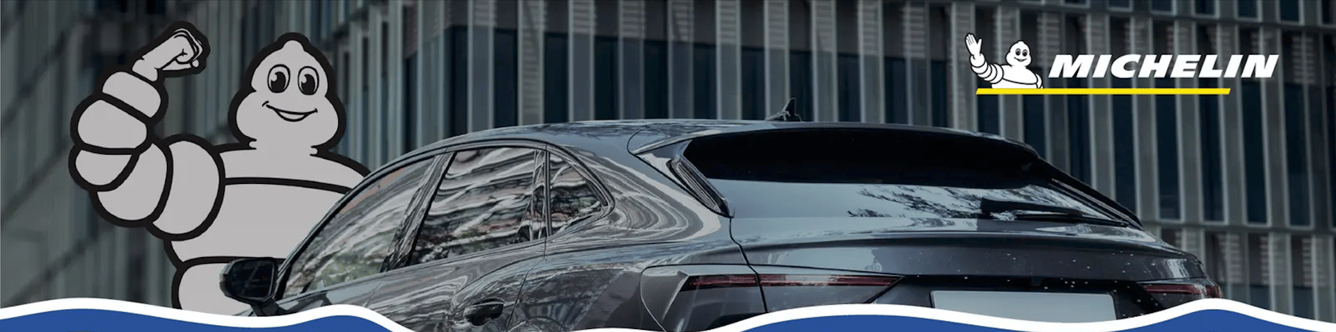 an abstract photo of a curved building with a blue sky in the background
