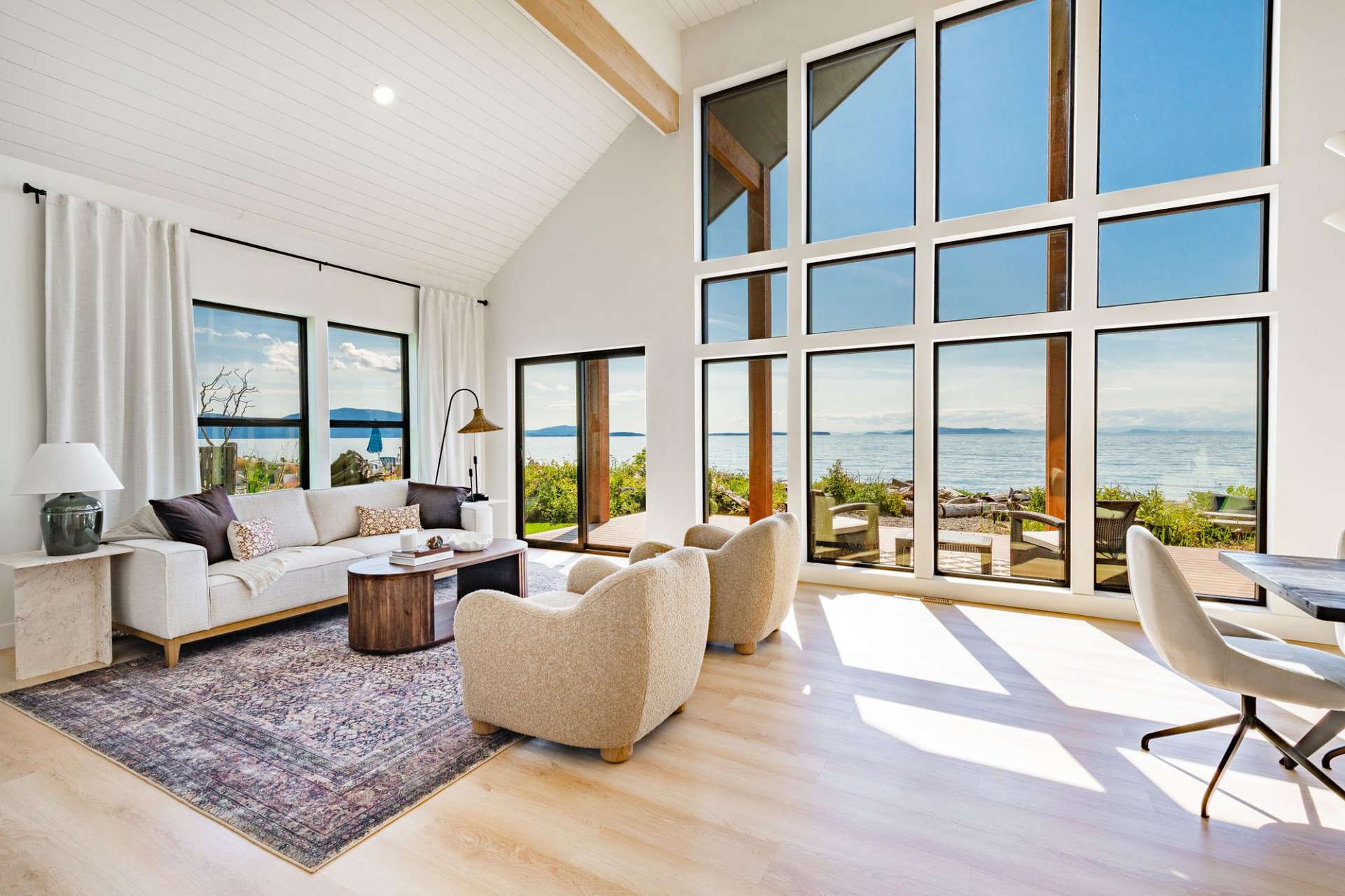 an abstract photo of a curved building with a blue sky in the background