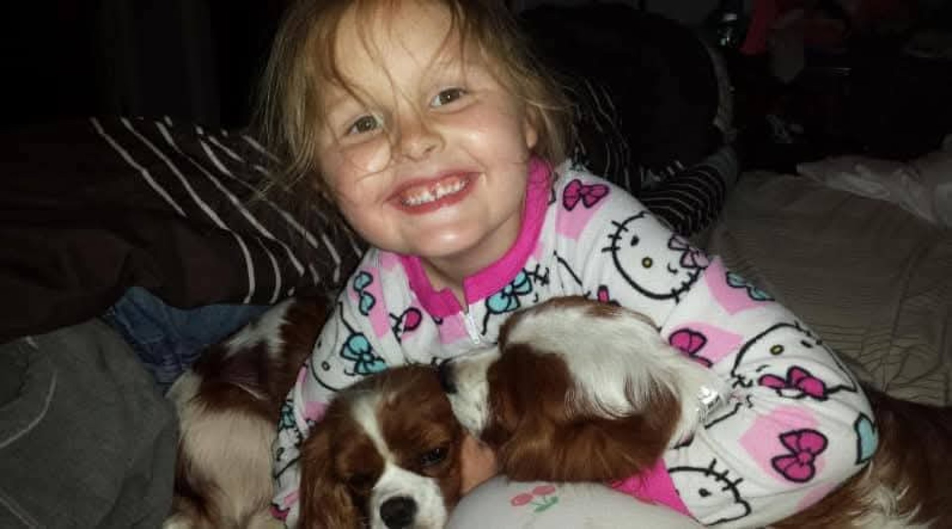 woman wearing yellow long-sleeved dress under white clouds and blue sky during daytime
