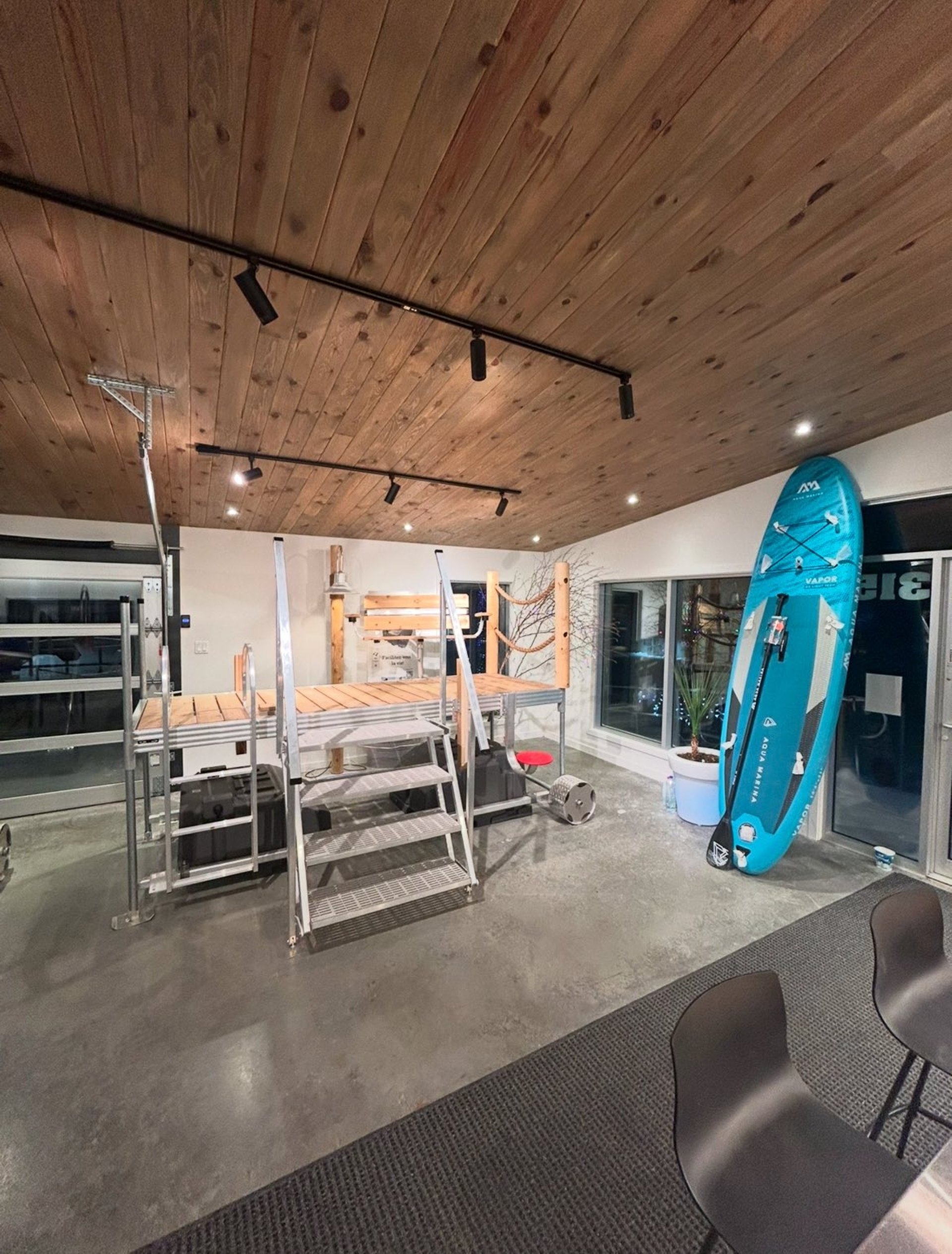 an abstract photo of a curved building with a blue sky in the background