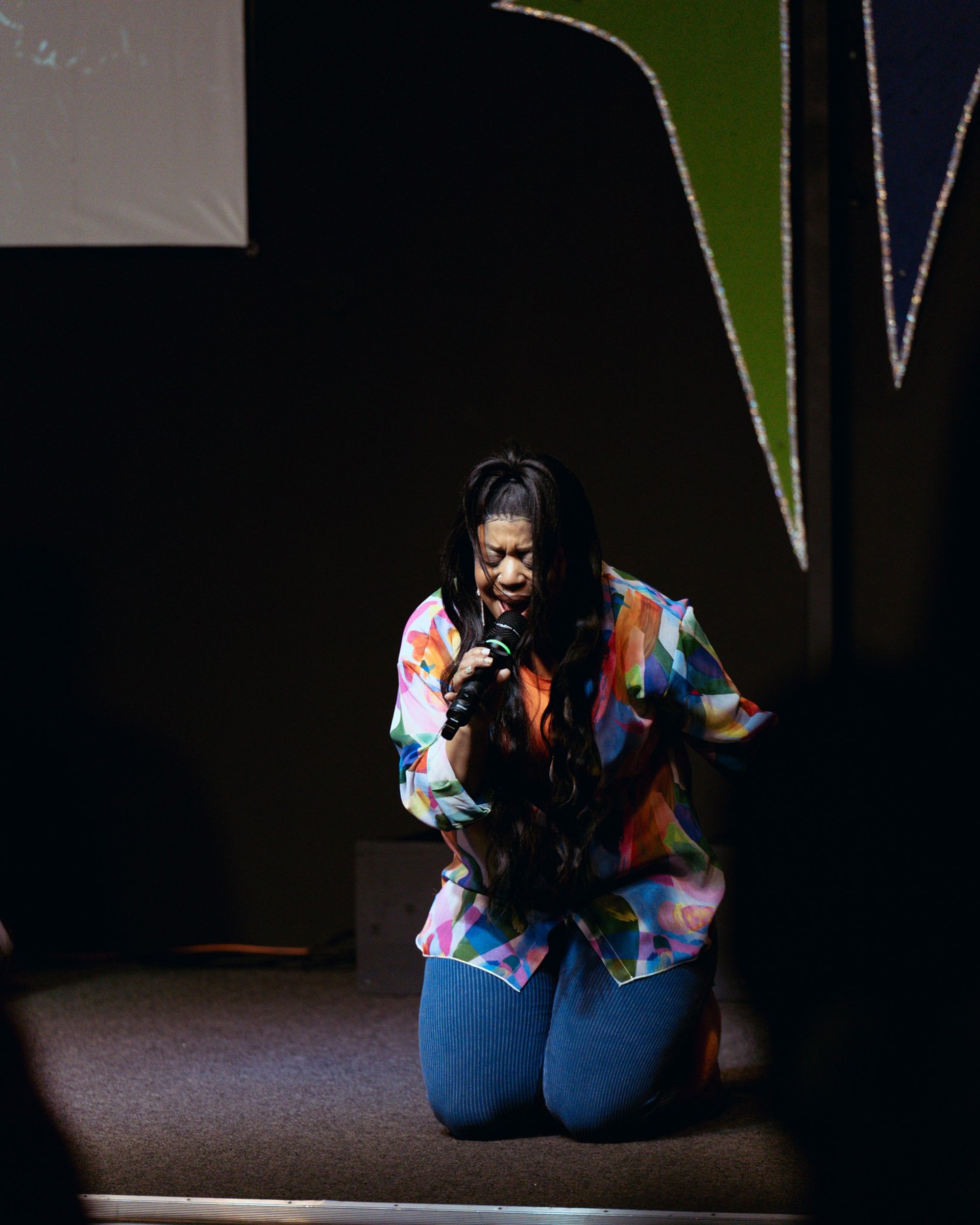 woman wearing yellow long-sleeved dress under white clouds and blue sky during daytime