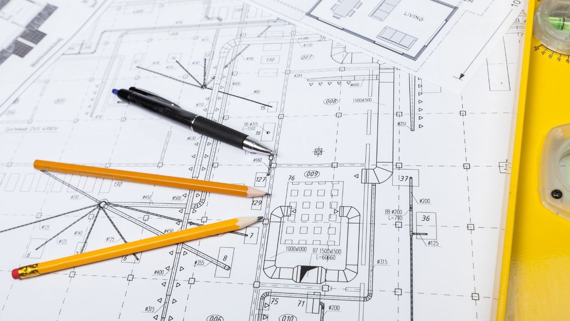 an abstract photo of a curved building with a blue sky in the background