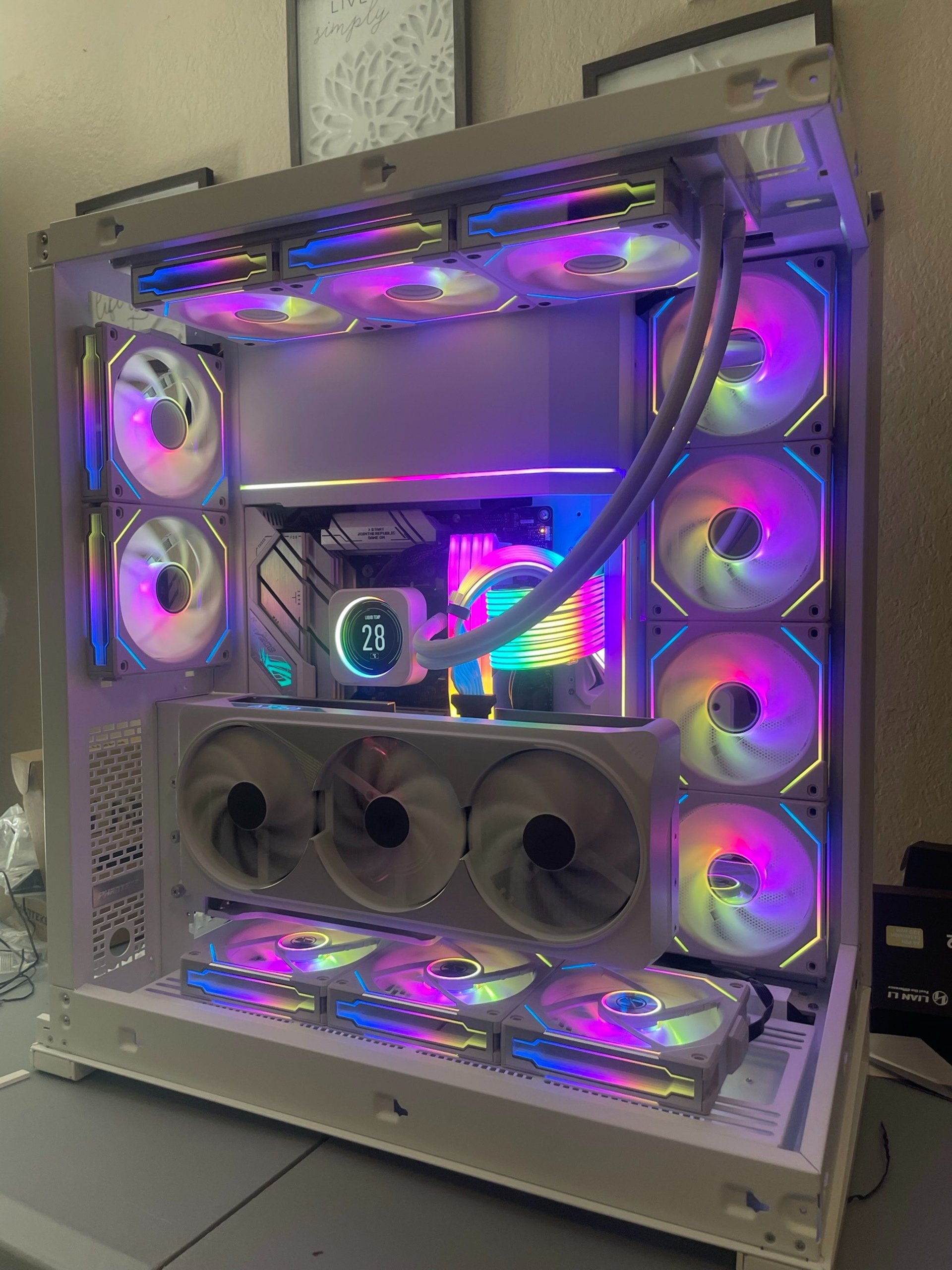 A man sanding a wooden table with a sander