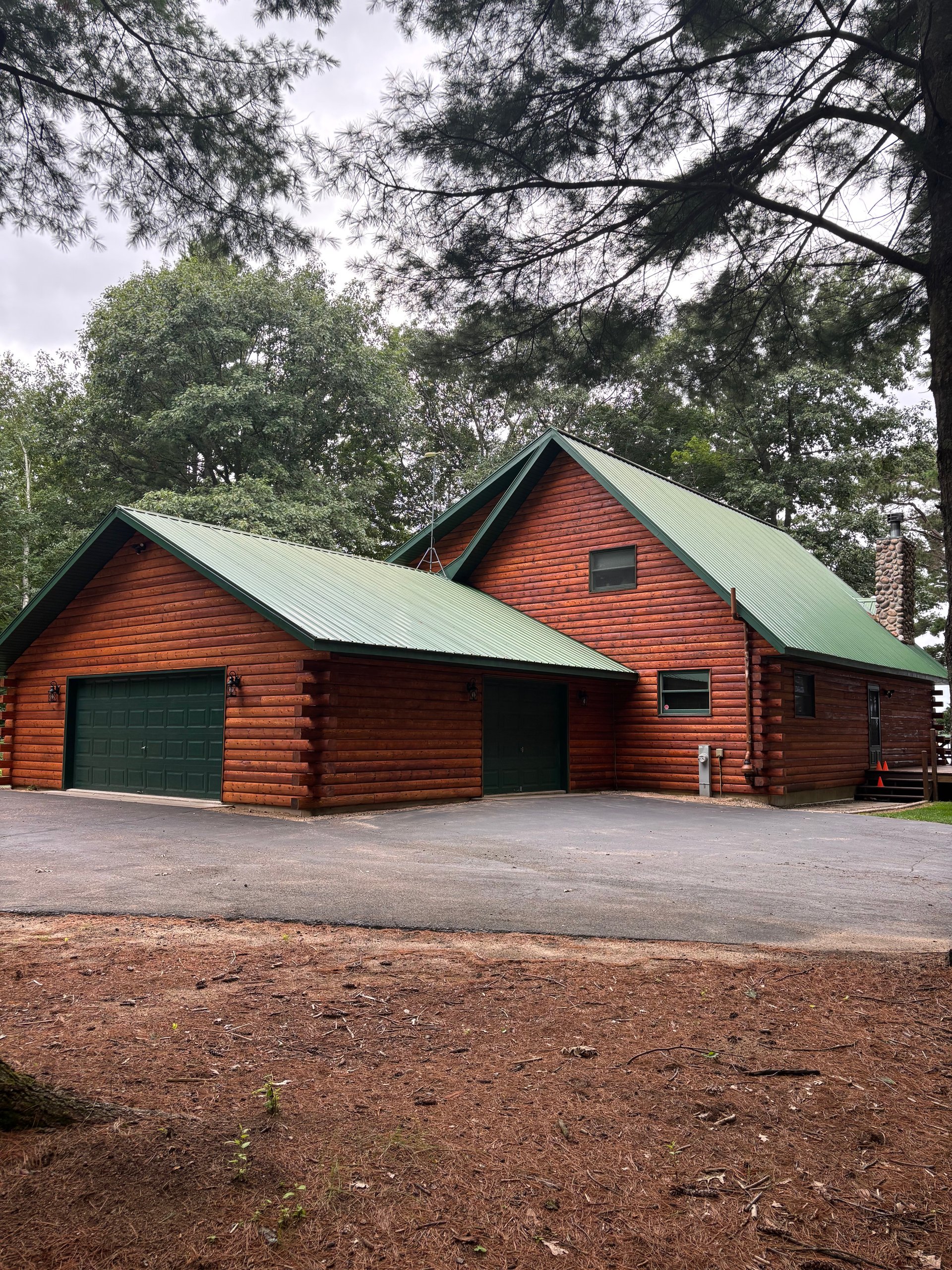 black and brown leather padded tub sofa