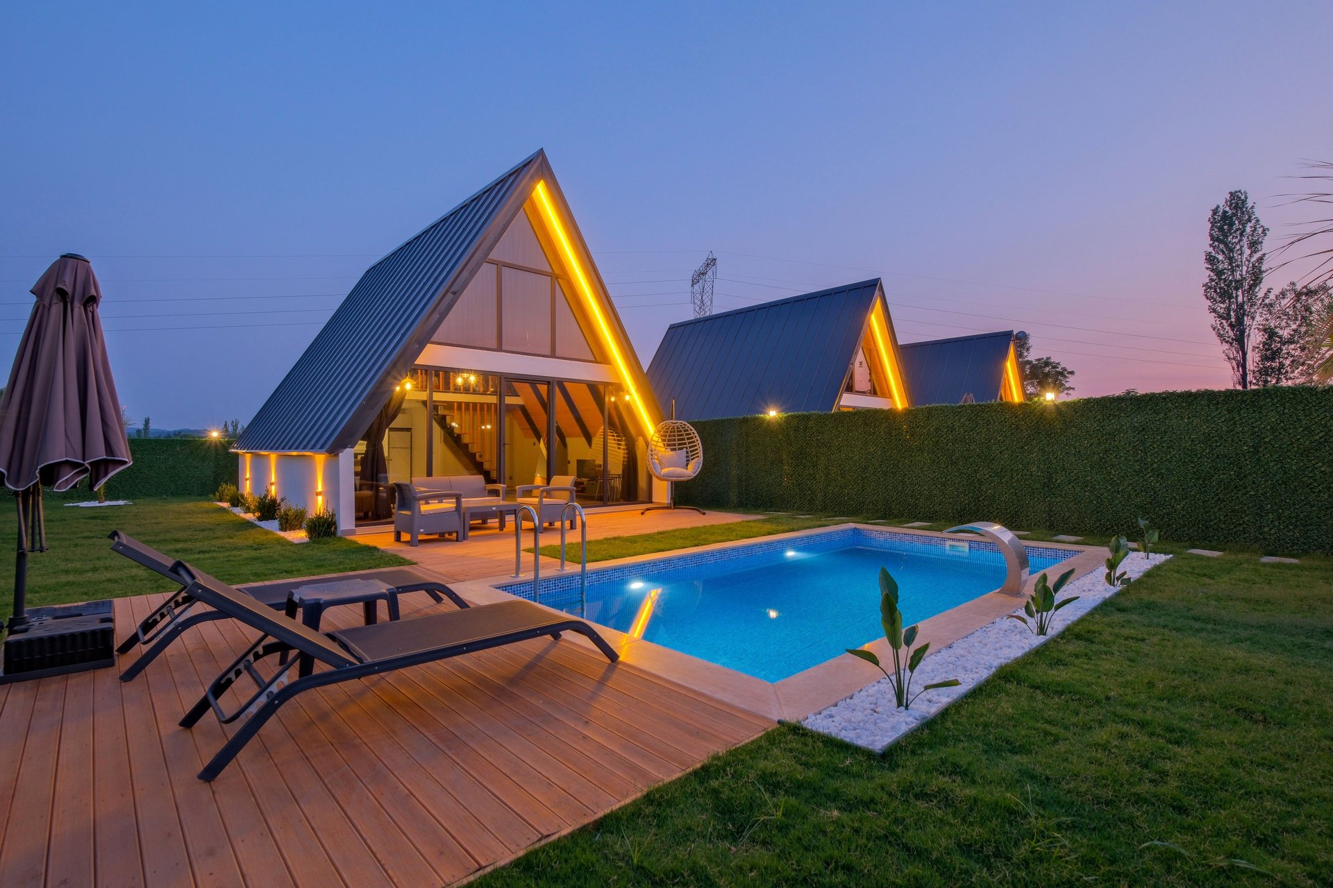 an abstract photo of a curved building with a blue sky in the background