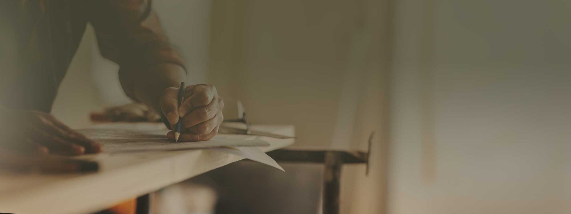 an abstract photo of a curved building with a blue sky in the background