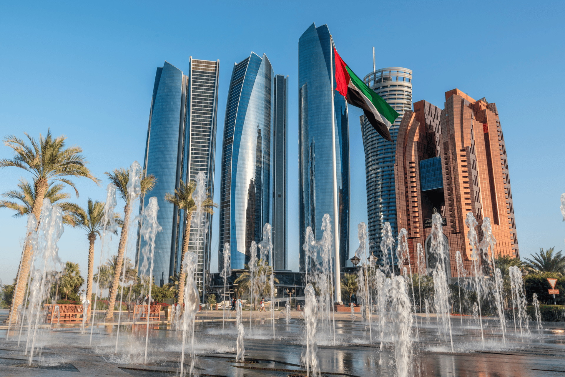 a city skyline with tall buildings