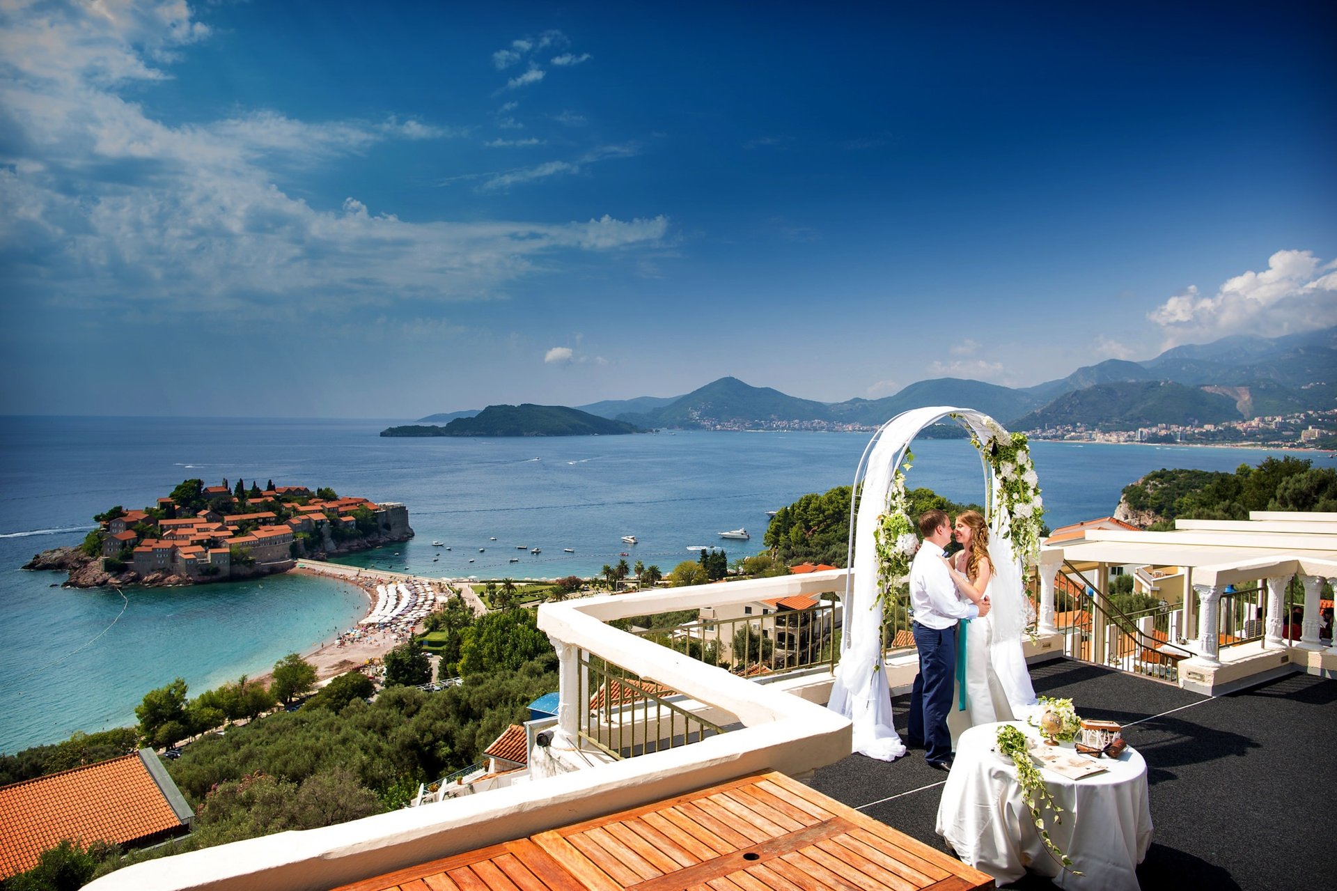 an abstract photo of a curved building with a blue sky in the background