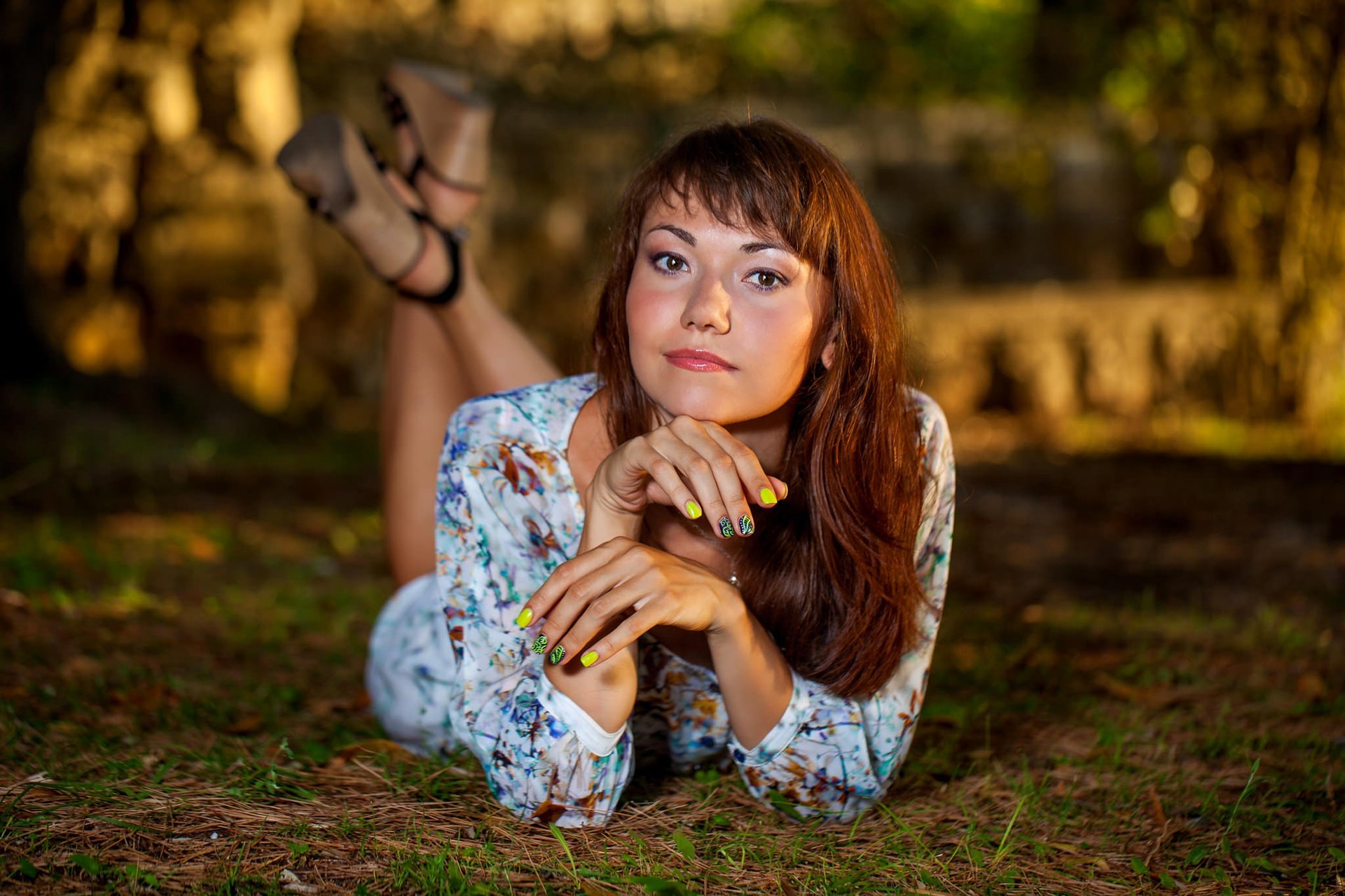 an abstract photo of a curved building with a blue sky in the background