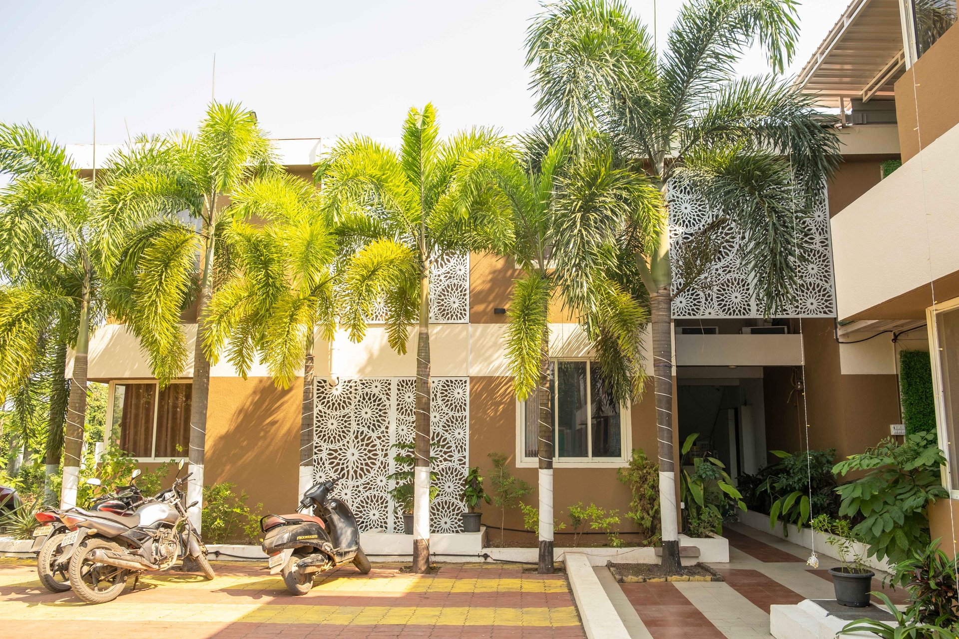 brown wooden table and chairs on brown wooden deck near body of water during daytime