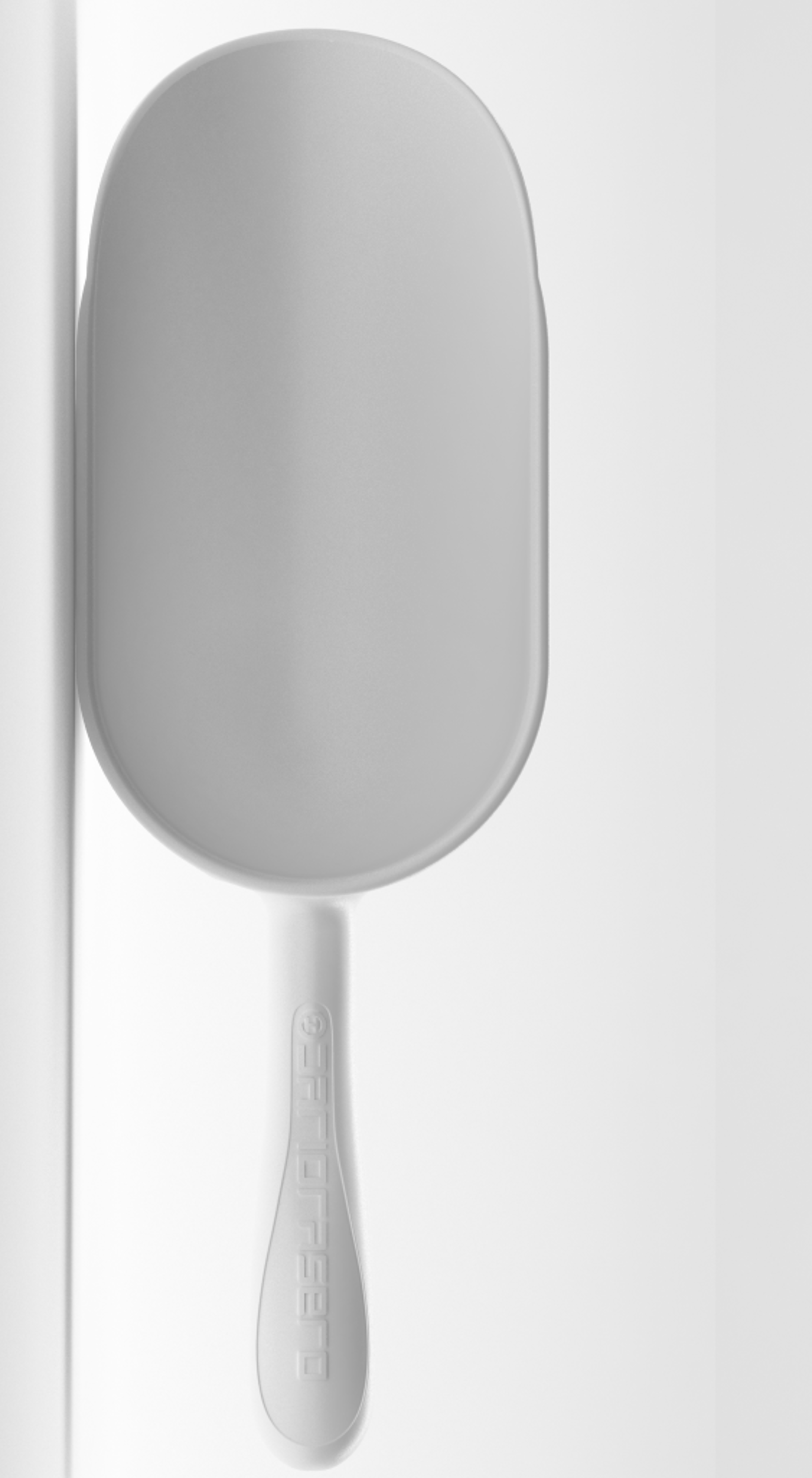 Vertical ergonomic white scoop. Space-saving for professional storage.