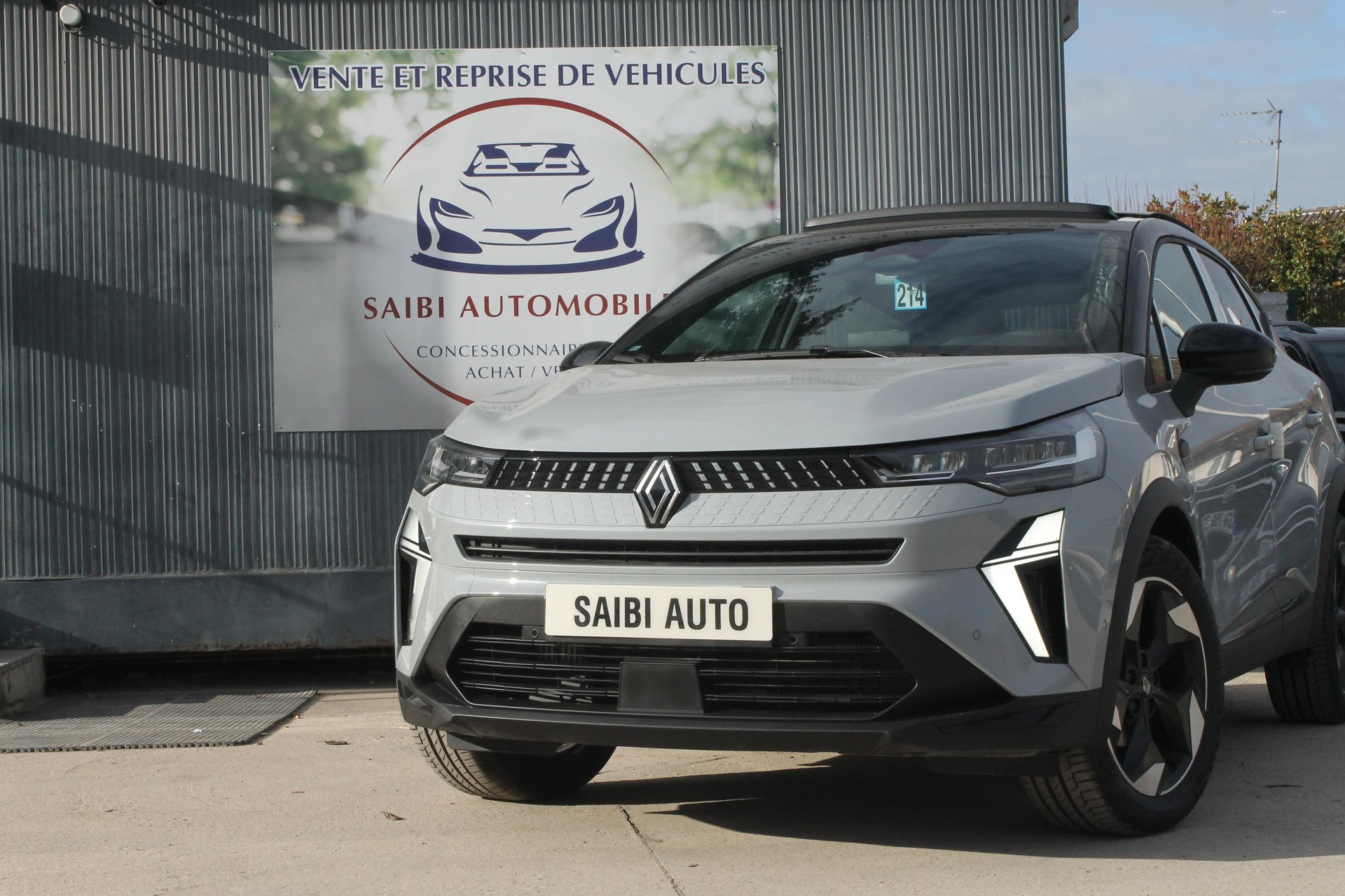 an abstract photo of a curved building with a blue sky in the background