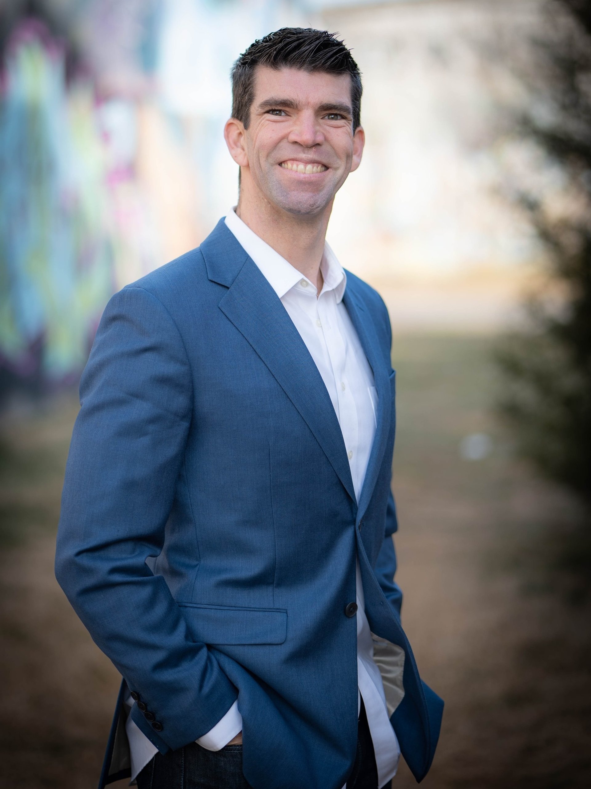 woman wearing yellow long-sleeved dress under white clouds and blue sky during daytime