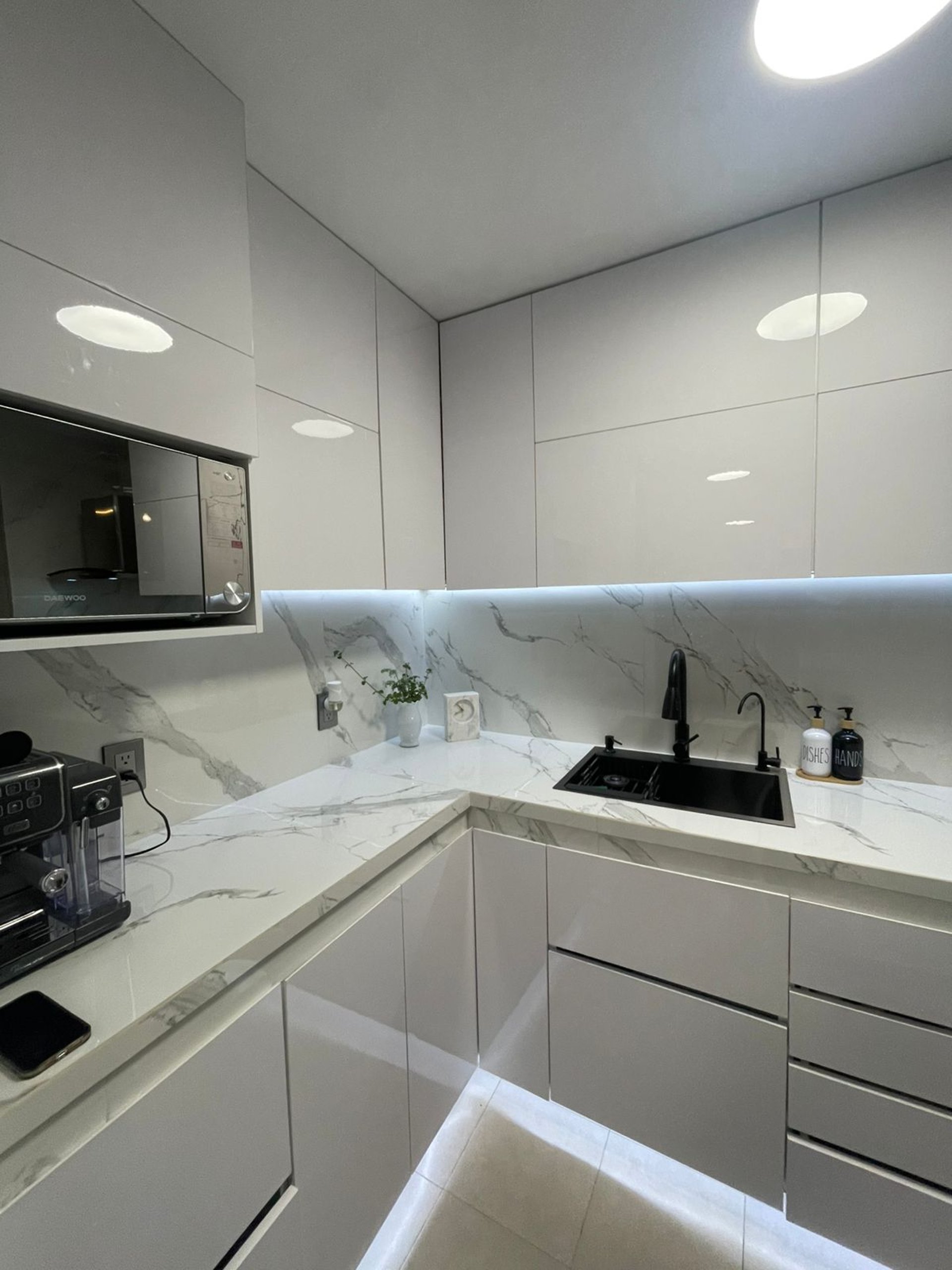 woman wearing yellow long-sleeved dress under white clouds and blue sky during daytime