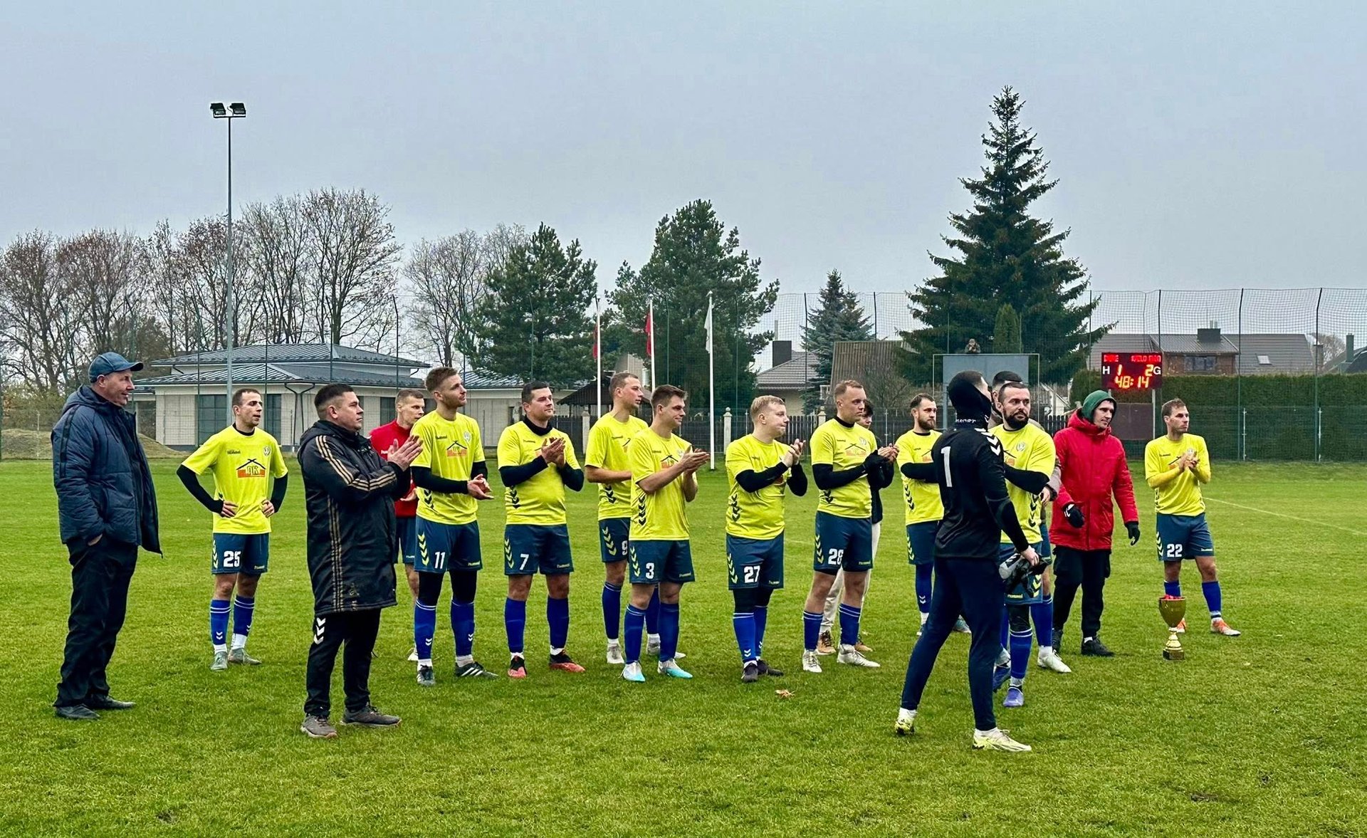woman wearing yellow long-sleeved dress under white clouds and blue sky during daytime