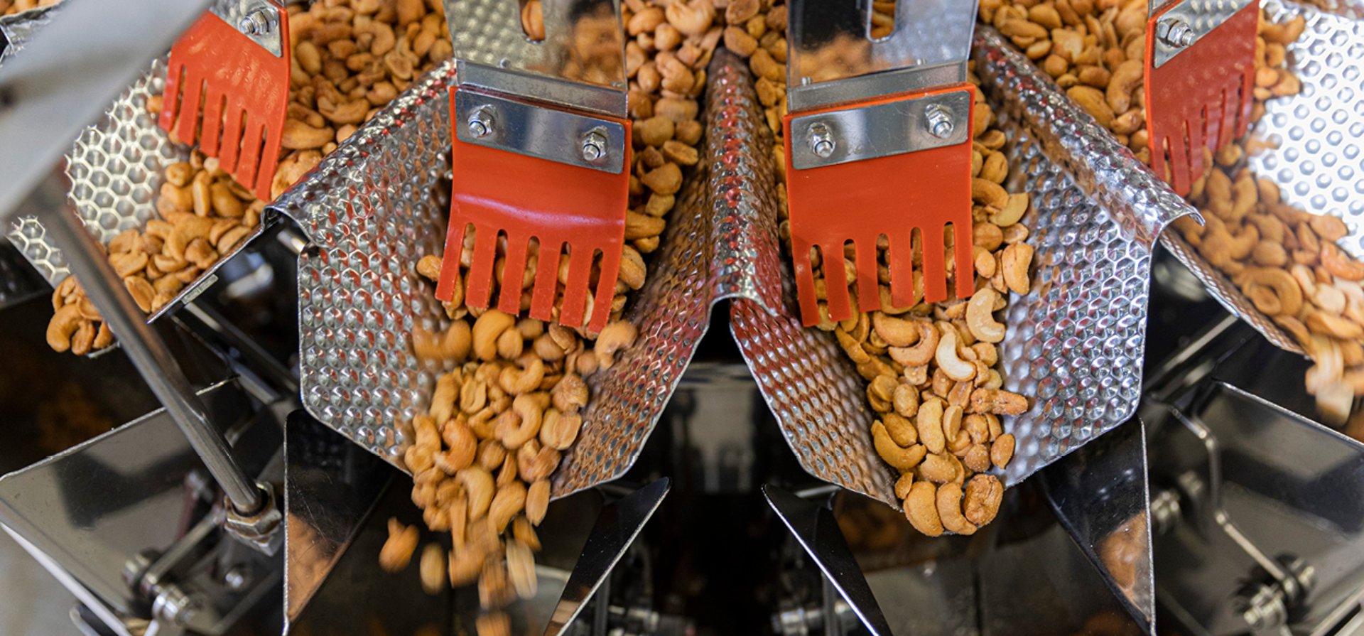 an abstract photo of a curved building with a blue sky in the background
