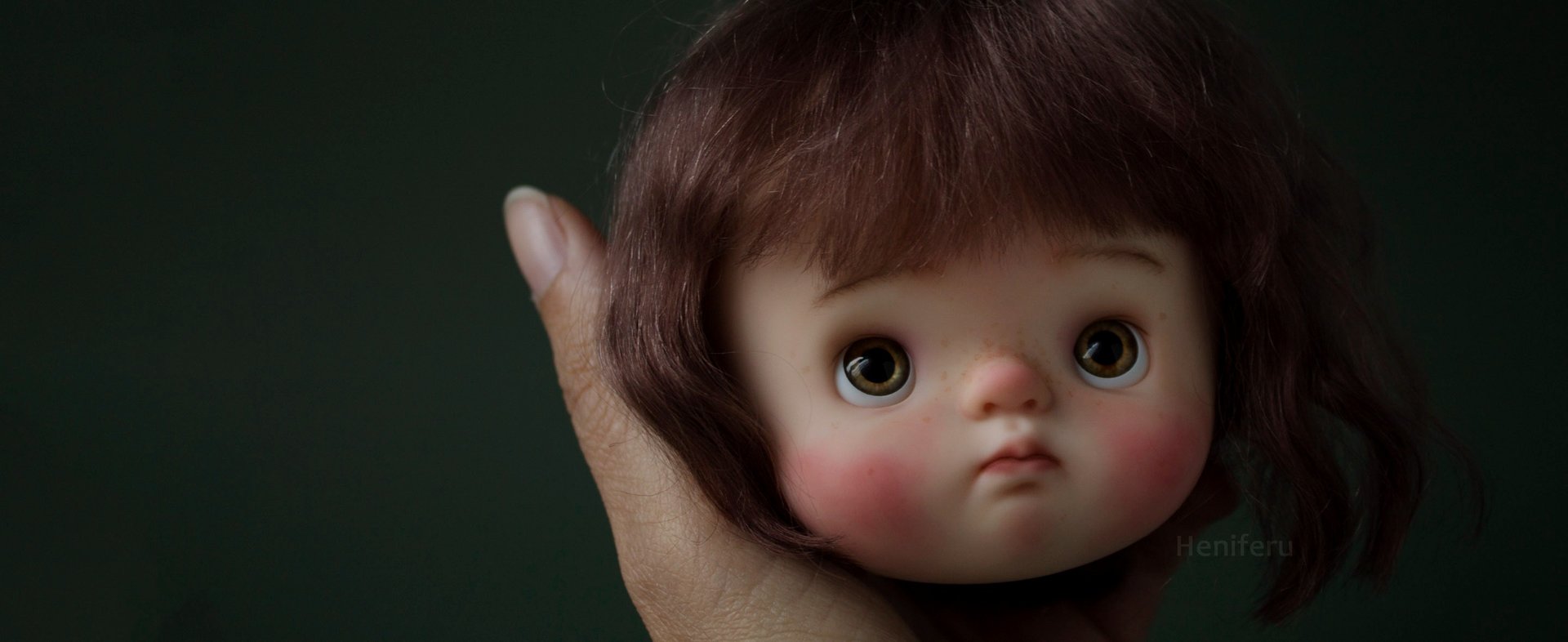 person wearing grey knit sweater