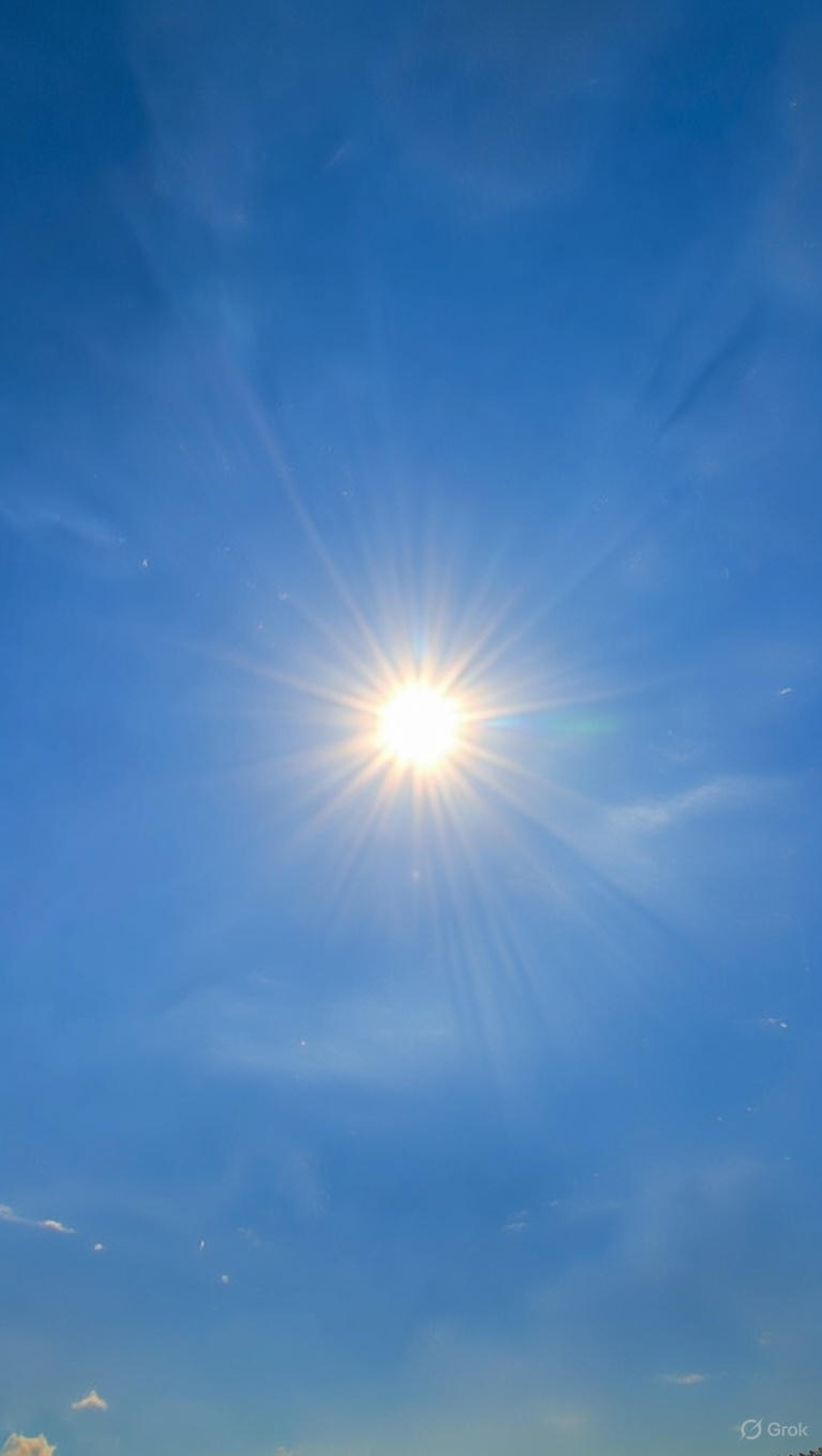 topless man covering face with both hands