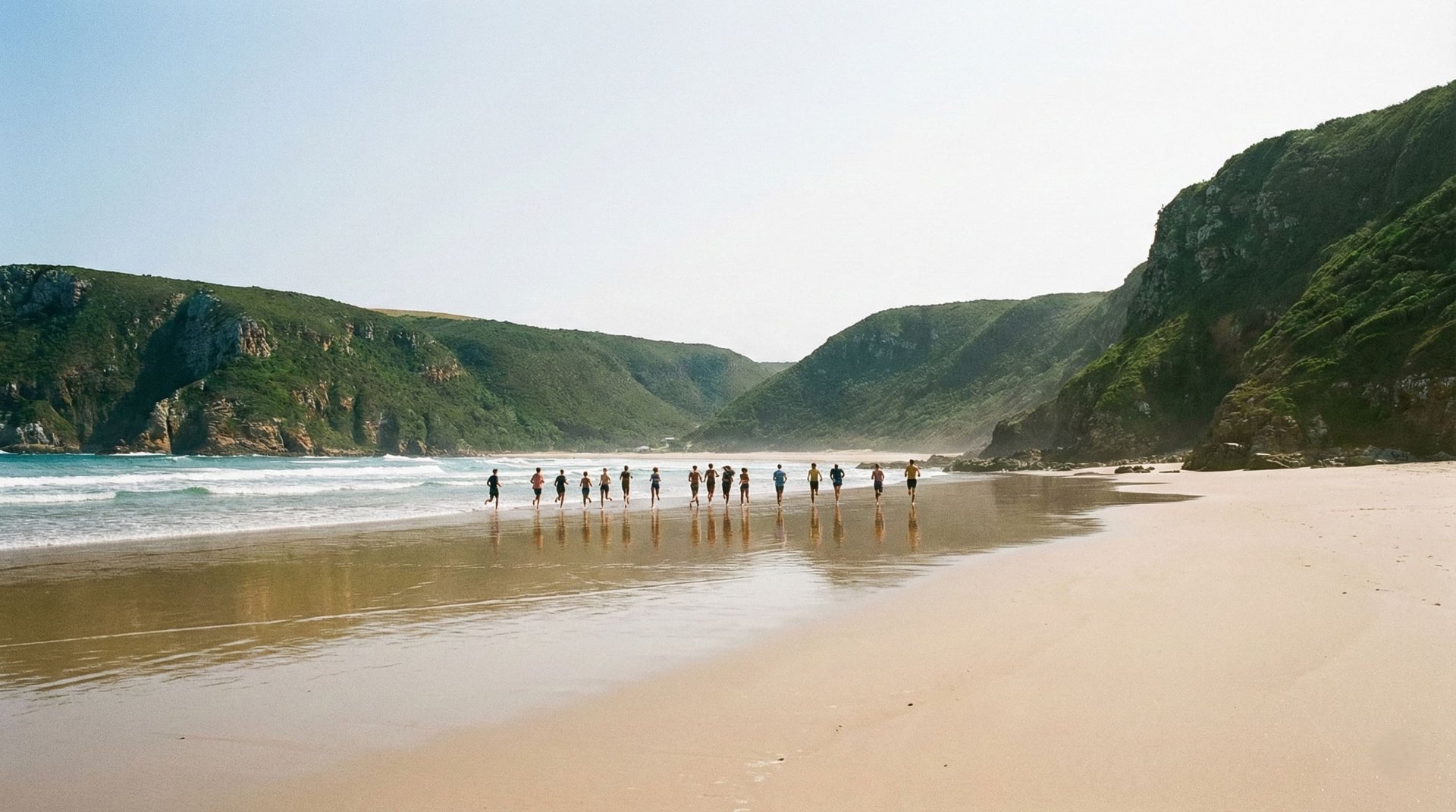 an abstract photo of a curved building with a blue sky in the background