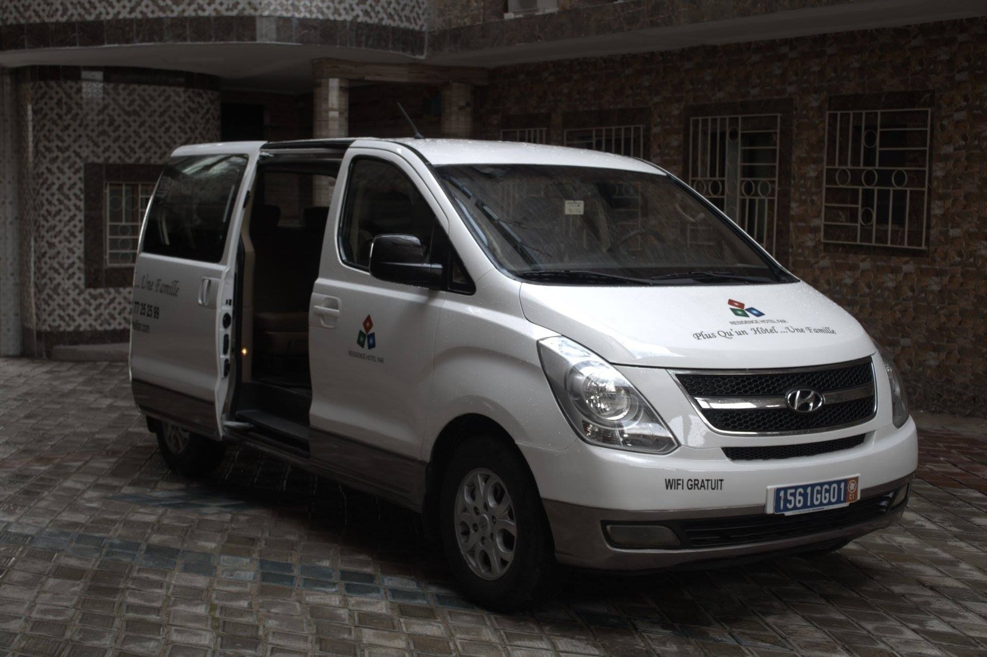 woman wearing yellow long-sleeved dress under white clouds and blue sky during daytime