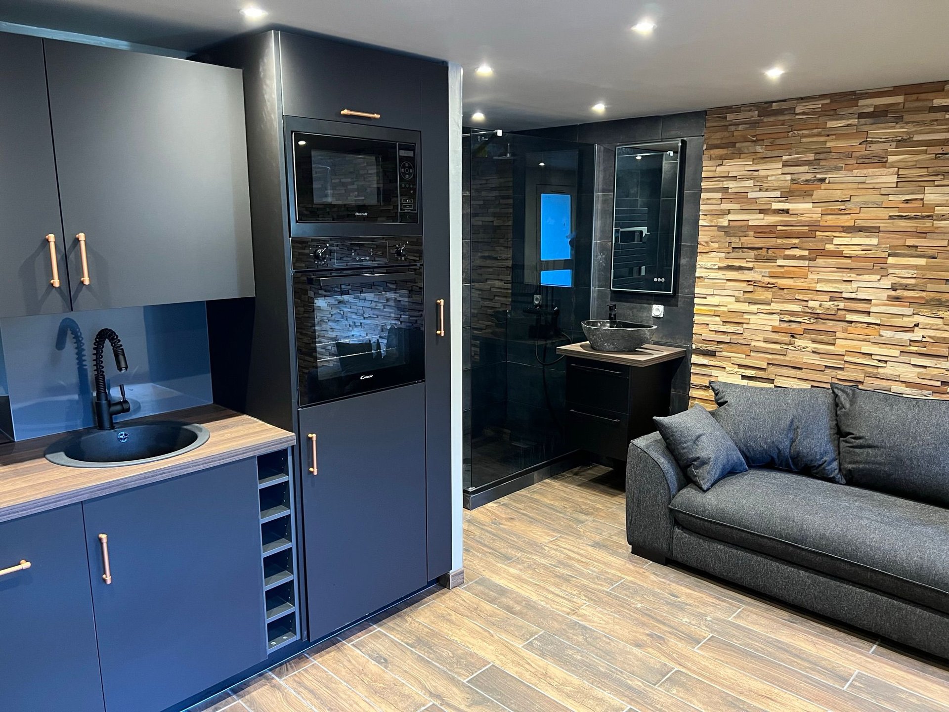 a close up of a black and brown abstract painting