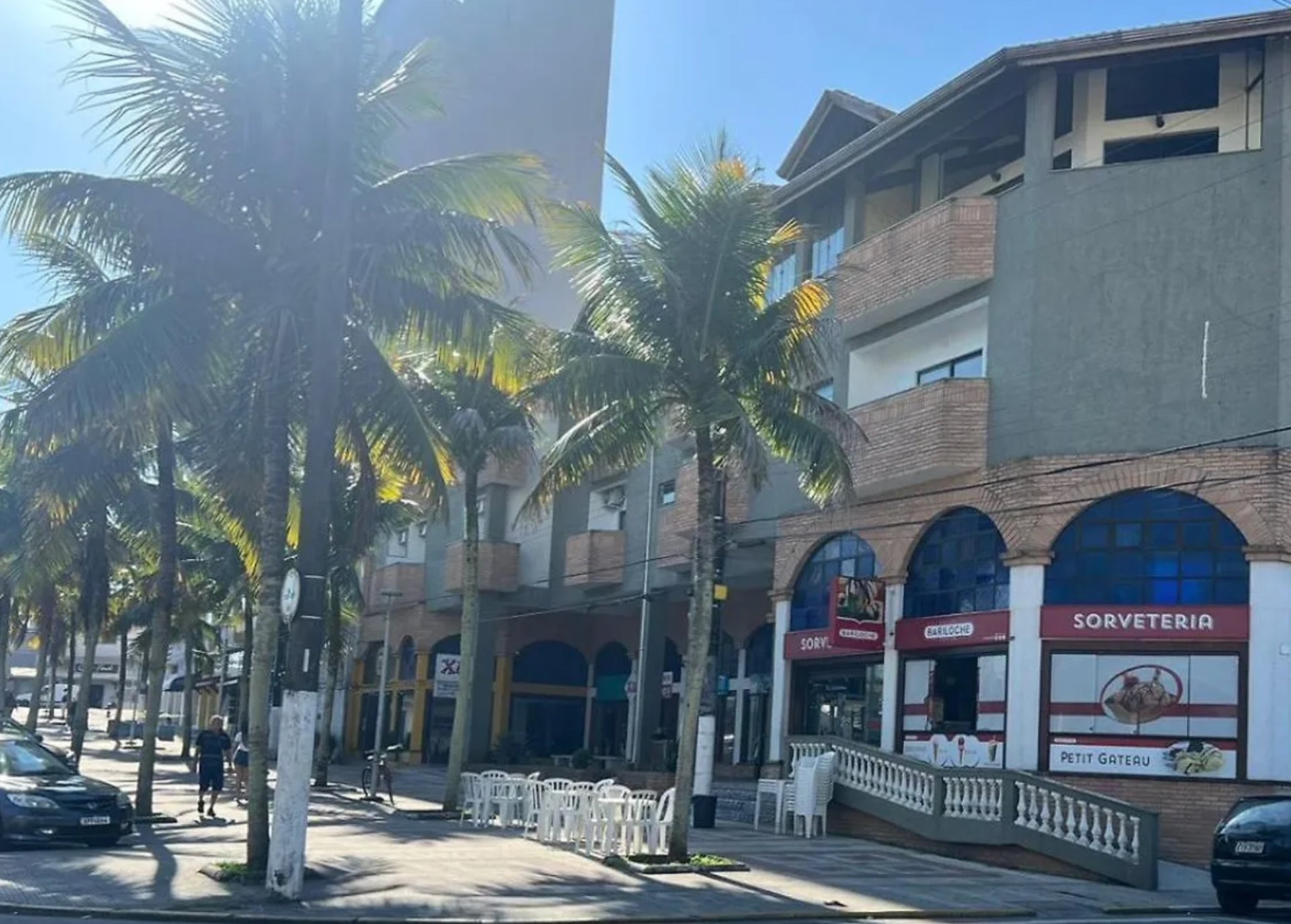 woman wearing yellow long-sleeved dress under white clouds and blue sky during daytime