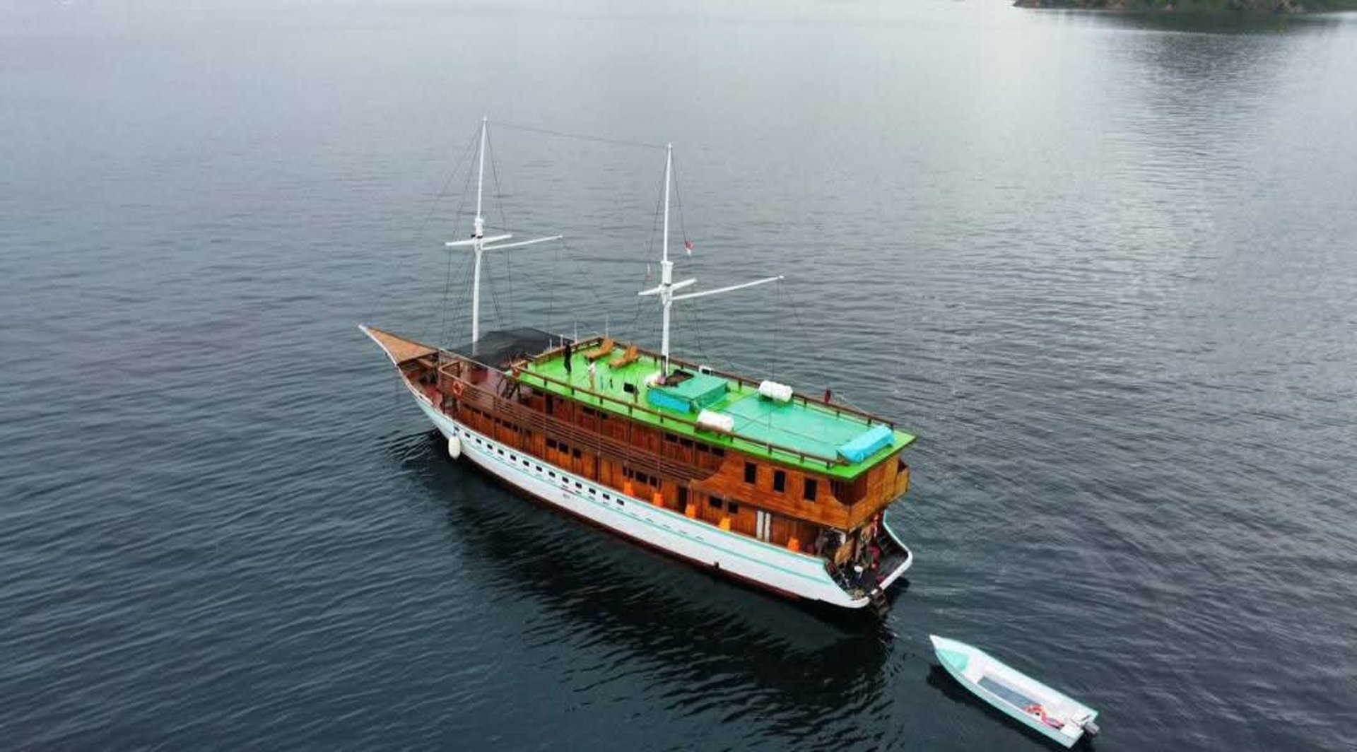 an abstract photo of a curved building with a blue sky in the background