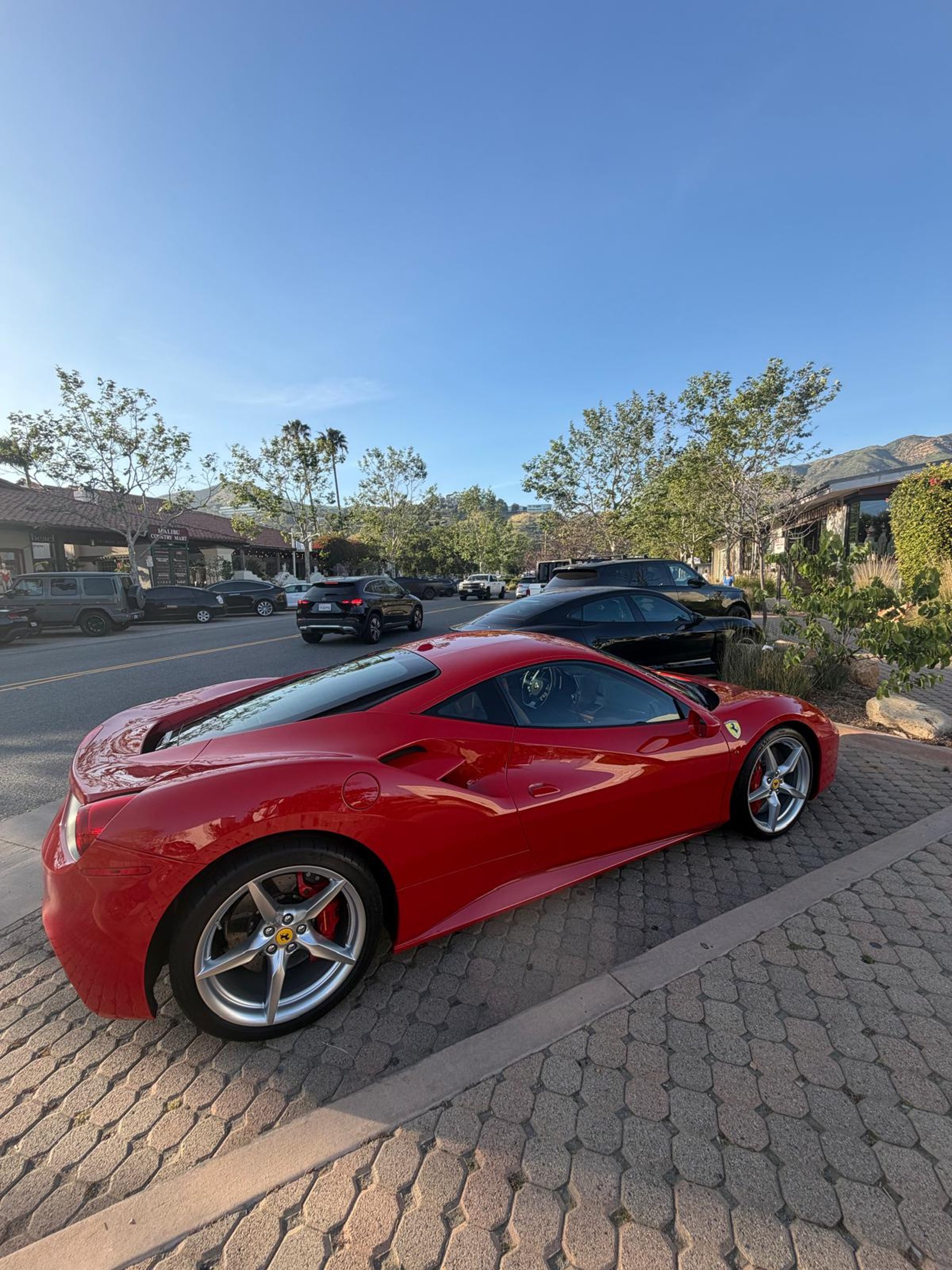 black and brown leather padded tub sofa