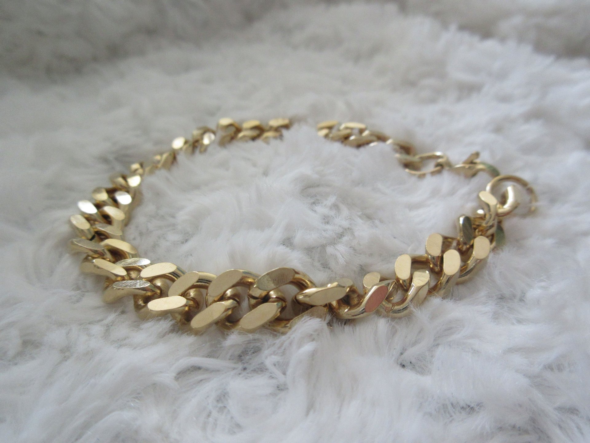 woman wearing yellow long-sleeved dress under white clouds and blue sky during daytime