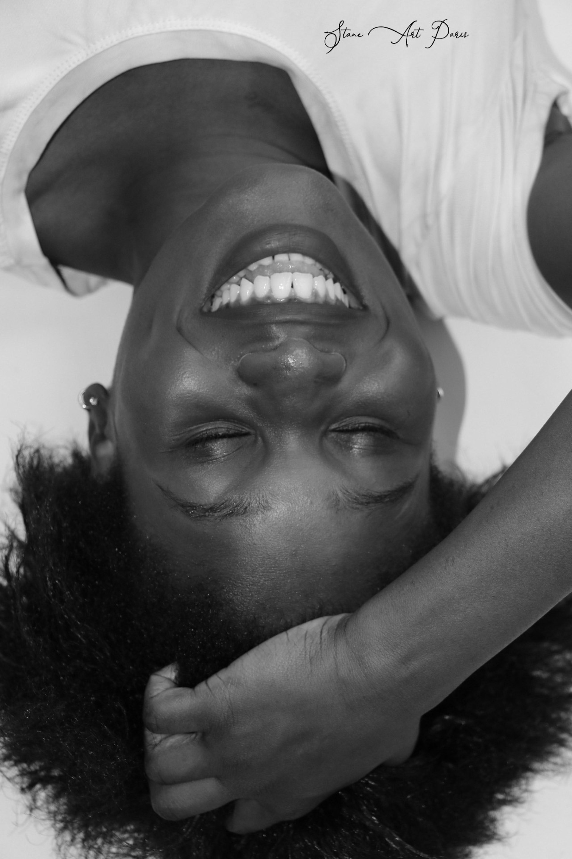 an abstract photo of a curved building with a blue sky in the background